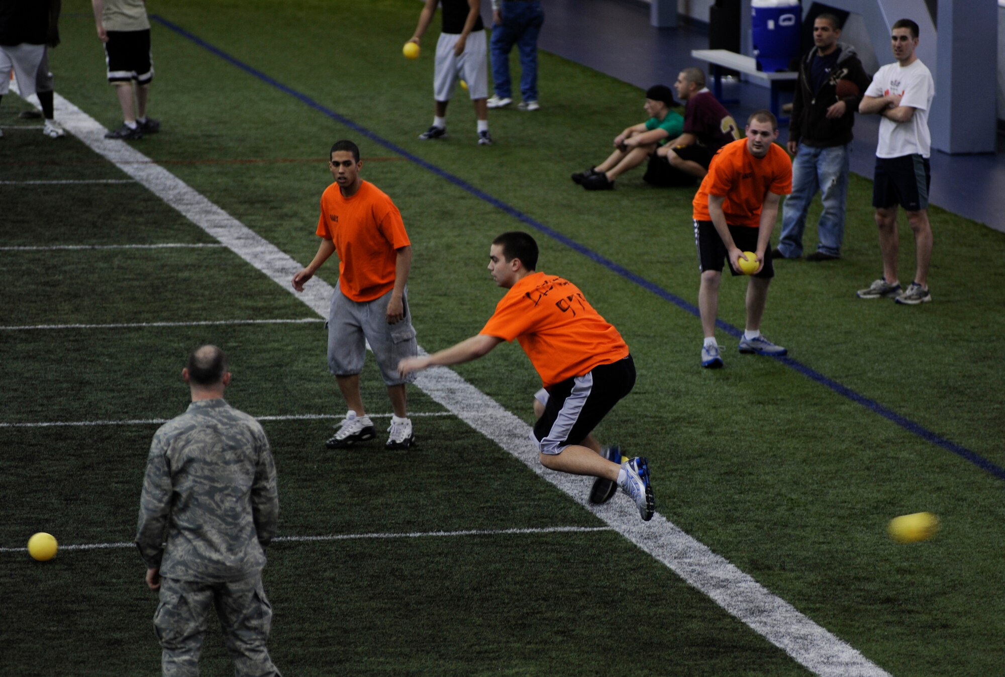 Senior Airman Scott Brown, 354th Fight Wing Electrical Systems Journeymen, jumps out of the way of a ball Feb. 27, 2009, Eielson Air Force Base, Alaska.  Several Airmen came out to the Baker Field House to show team spirit for their shops by playing a game of dodgeball.  (U.S. Air Force photo/Airman 1st Class Laura Max)