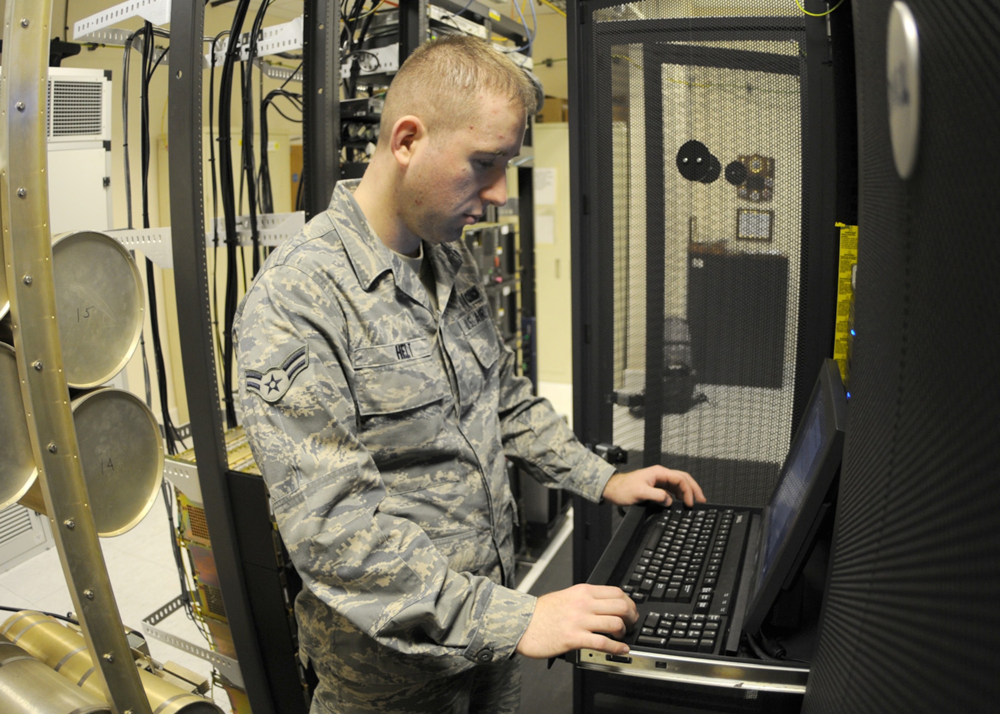 Airman 1st Class Stefan Helt, a network operations technician from the 100th Communications Squadron, ensures the Non-secured Internet Packet Routed Network (NIPR Net) is operating properly Feb. 25, 2009, at RAF Mildenhall, England. The NIPR Net is the server which processes and stores numerous unclassified materials such as e-mail software and data files for example. (Air Force photo by Staff Sgt. Jerry Fleshman)