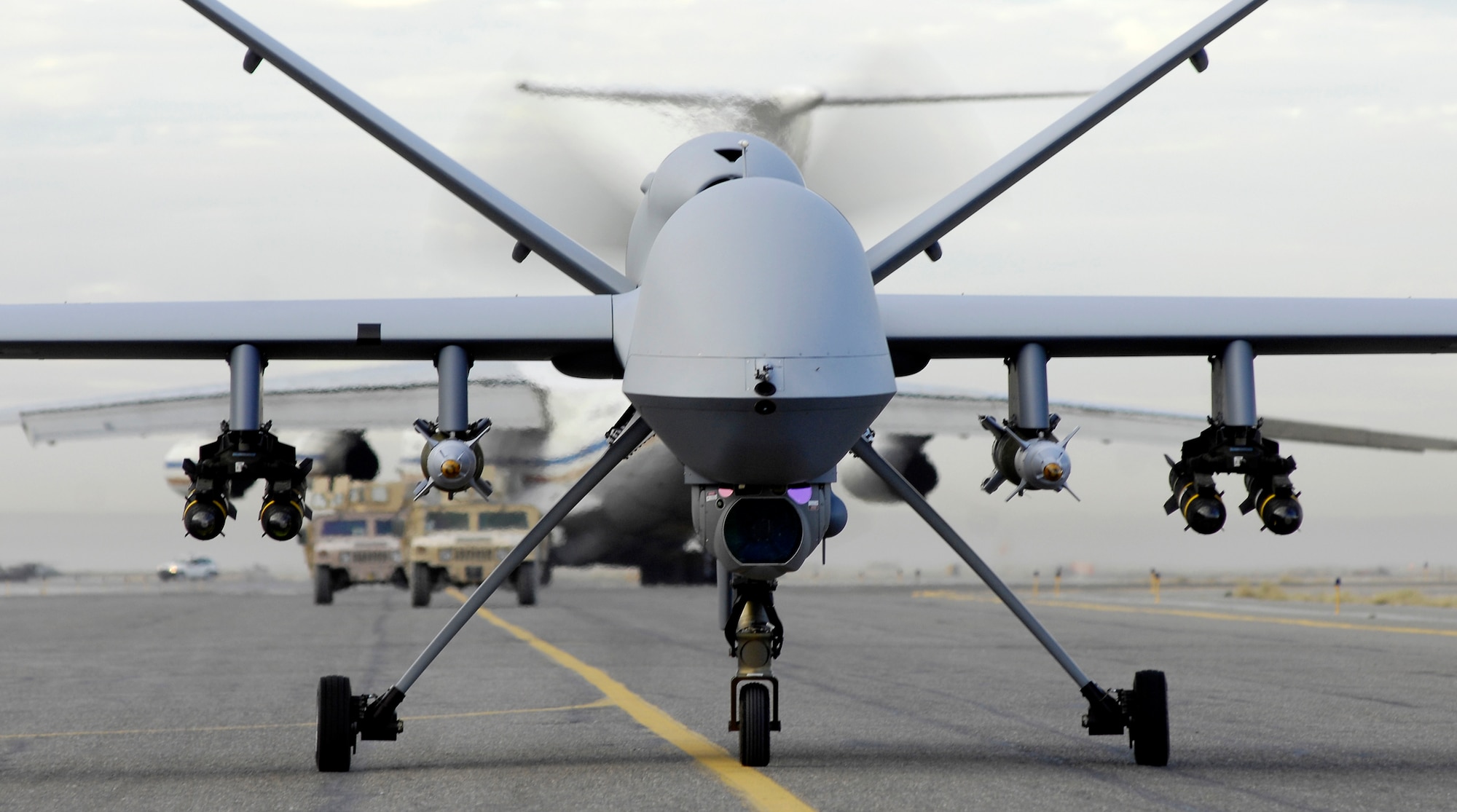 A fully armed MQ-9 Reaper taxis down a runway in Afghanistan. The Reaper is designed to go after time-sensitive targets with persistence and precision, and destroy those targets. (U.S. Air Force photo/Staff Sgt. Brian Ferguson)