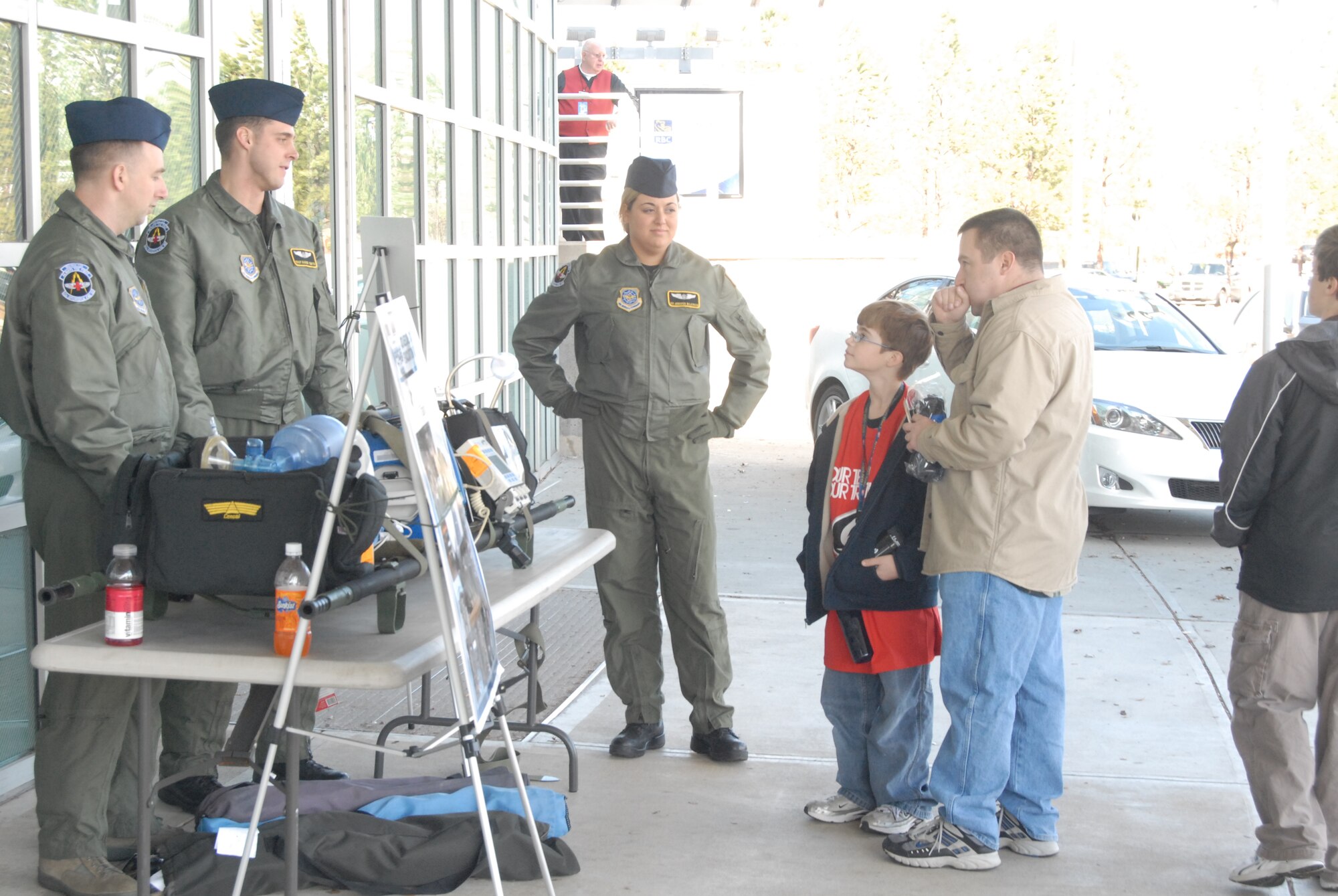 Members of the 43rd Aeromedical Evacuation Squadron talk to spectators about their communications equipment prior to the Carolina Hurricanes Military Appreciation Game VS the Colorado Avalanche, Feb. 22, 2009 at the RBC Center in Raleigh, N.C. (U.S Air Force Photo by 2nd Lt. Chris Hoyler)