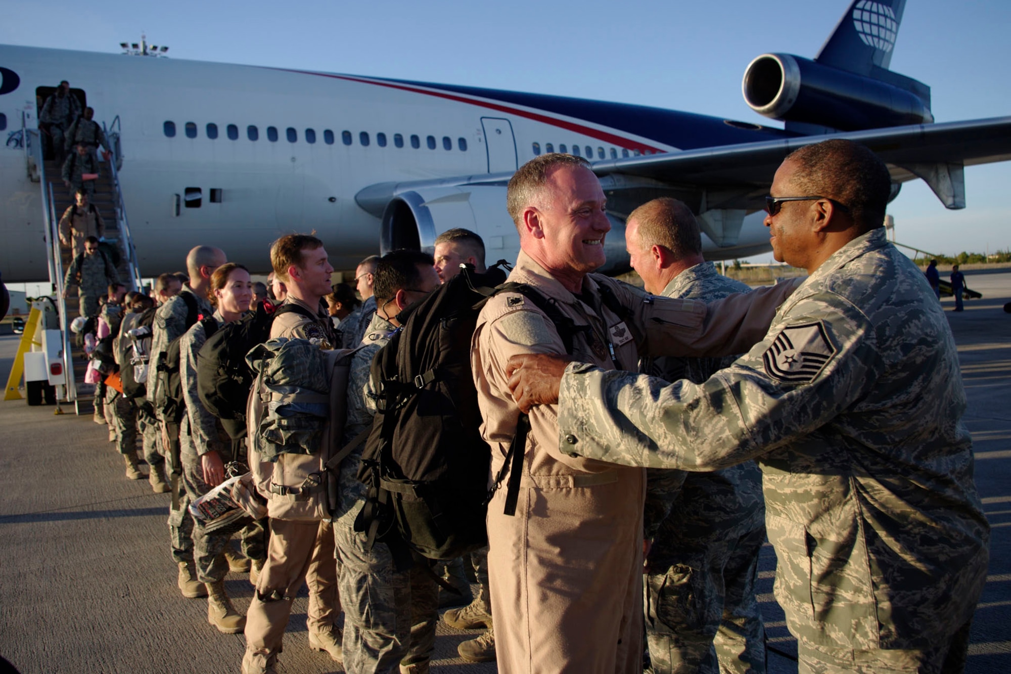 HOMESTEAD AIR RESERVE BASE, Fla. -- Seventy five Air Force reservists from the 482nd Fighter Wing returned home after a two-month deployment to Joint Base Balad, Iraq, on Feb. 28. The returning pilots and maintenance crews generated hundreds of close air support and surveillance and reconnaissance missions in support of U.S., Iraqi and Coalition ground forces. Saturday’s homecoming is part of a larger deployment package of almost 400 reservists deployed to two locations in Iraq. Ten F-16 fighter jets from Homestead ARB remain in Iraq, and reservists will continue to rotate in and out over the next two months. (Courtesy photo by Albert Siegel)
