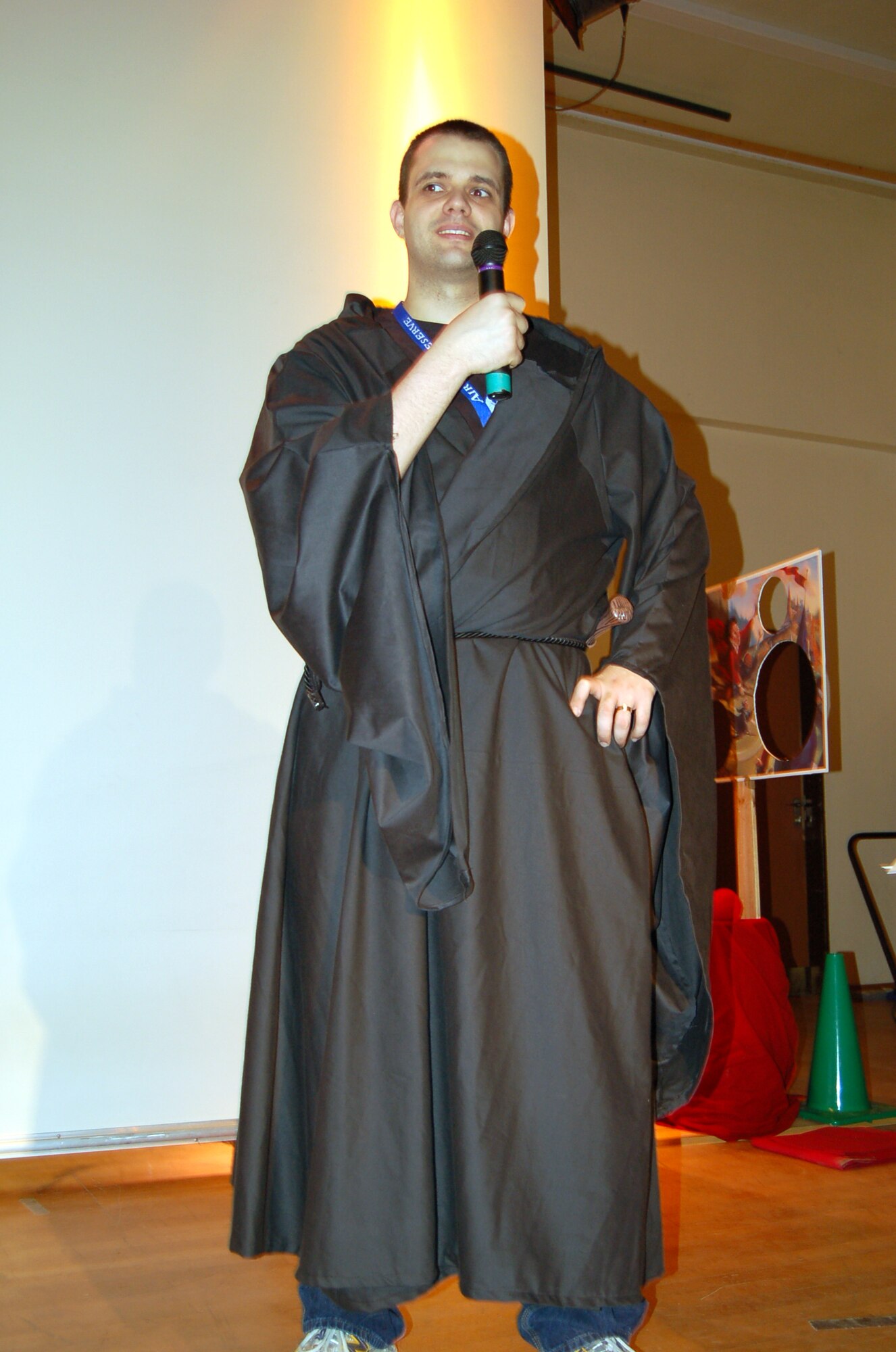 SPANGDAHLEM AIR BASE, Germany – Airman 1st Class Jarrod Garceau, 52nd Medical Operations Squadron, tells the crowd about the upcoming Quidditch tournament during the Harry Potter Convention at the Brick House Feb. 28, 2009. Airman Garceau organized the convention. (U.S. Air Force photo by Staff Sgt. Tammie Moore)