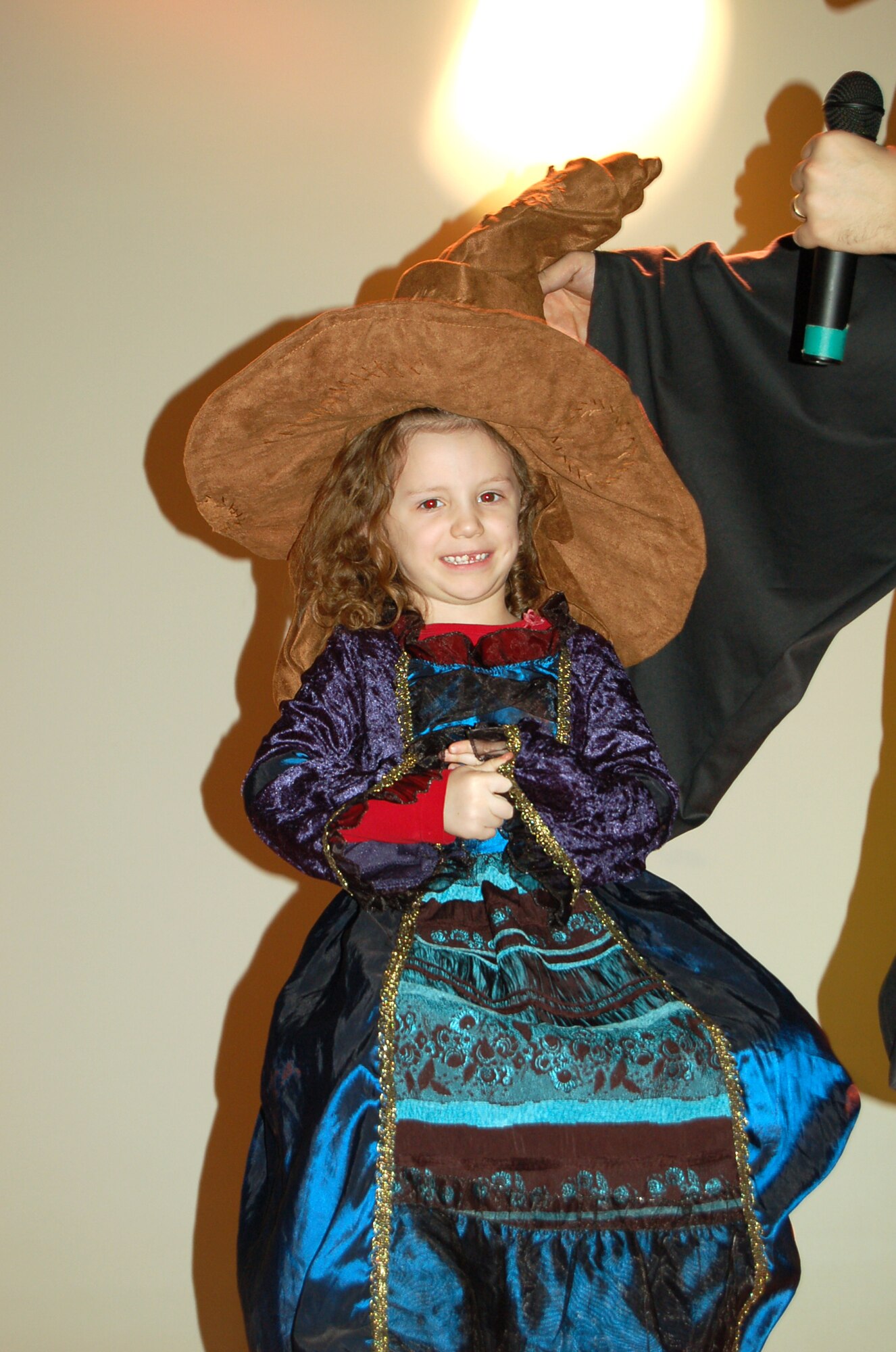 SPANGDAHLEM AIR BASE, Germany – Hannah Anderson, daughter of Mary and Capt. Christopher Anderson, 52nd Force Support Squadron, sits on a stool as the Sorting Hat determines what Hogwarts house she will be placed in Feb. 28, 2009. Hannah and her siblings spent the afternoon enjoying the festivities of the Harry Potter Convention at the Brick House. (U.S. Air Force photo by Staff Sgt. Tammie Moore)