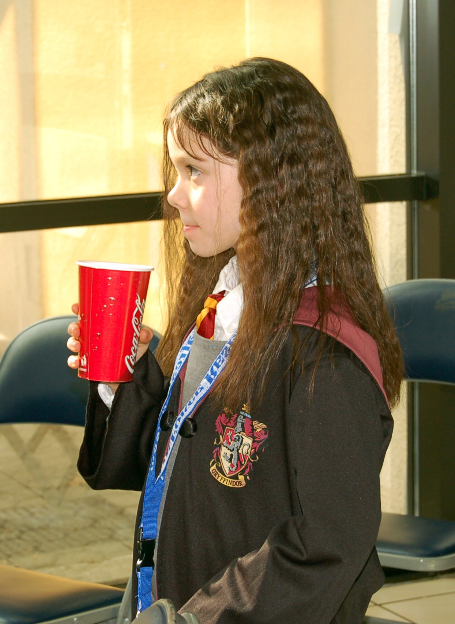 SPANGDAHLEM AIR BASE, Germany – Sierra Uribe, daughter of Keagan and Maj. Manuel Uribe, 23rd Fighter Squadron, enjoys a Butterbeer during the Harry Potter Convention in the Brick House Feb. 28, 2009. In the Harry Potter books Butterbeer is the drink of choice at The Three Broomsticks in Hogsmead. (U.S. Air Force photo by Staff Sgt. Tammie Moore)