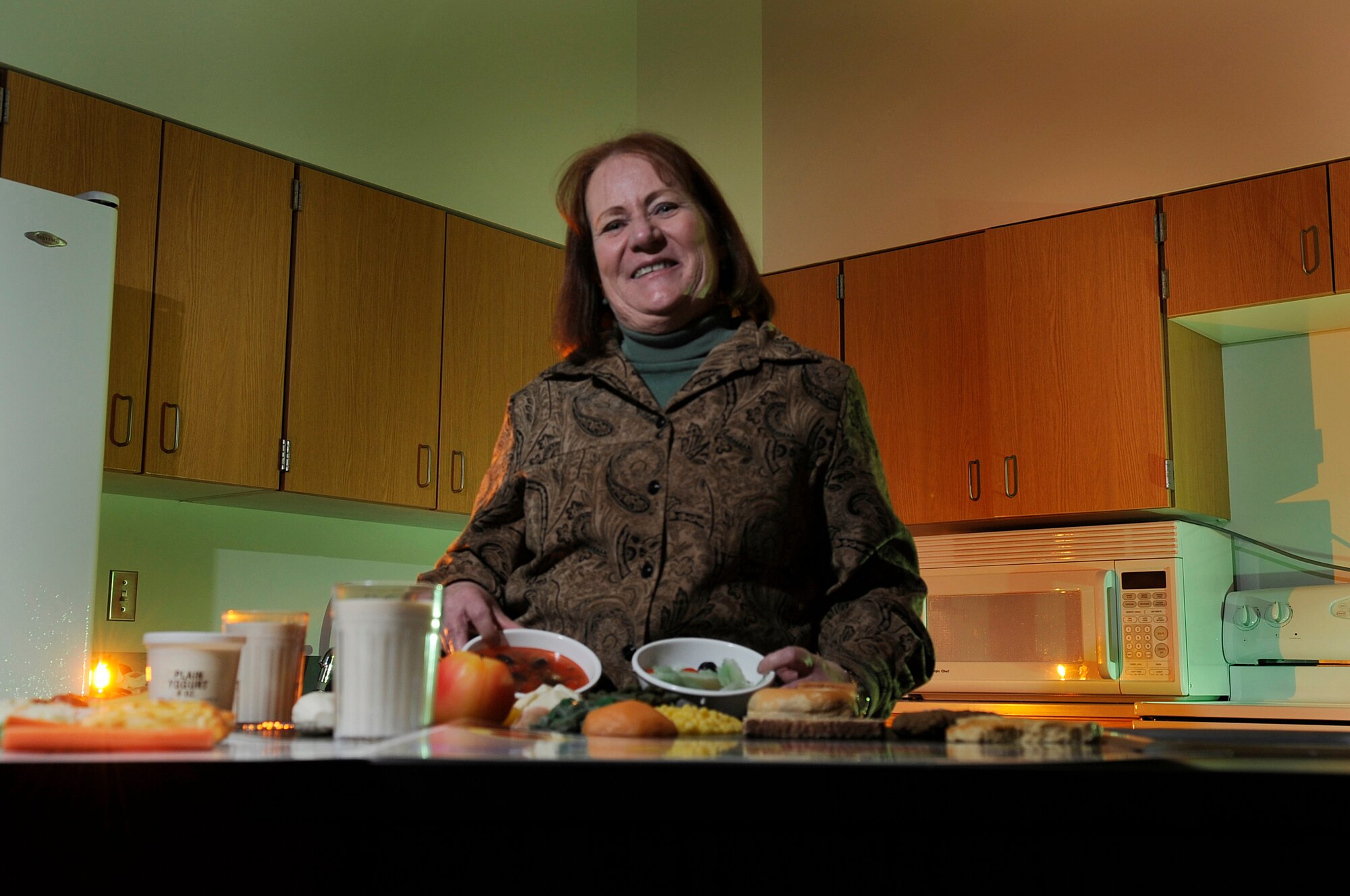 Susan Runyan, Health and Wellness Center dietitian, displays the food aids she uses to teach Iceman about healthy meal portions March 2, 2009, Eielson Air Force Base, Alaska. The HAWC offers several programs to help Icemen to maintain a healthy lifestyle.