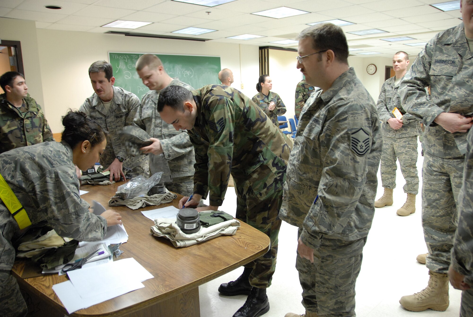 ELMENDORF AIR FORCE BASE, Alaska -- Members of the 477th Civil Engineer Squadron pick up final supply items, days before the units deployment to Iraq.  This is the first deployment for the 477 CES since World War II.  They are the only Air Force Reserve Civil Engineer Squadron in Alaska and are assigned to the 477th Fighter Group. (US Air Force Photo by Staff Sgt. Rhiannon Willard)