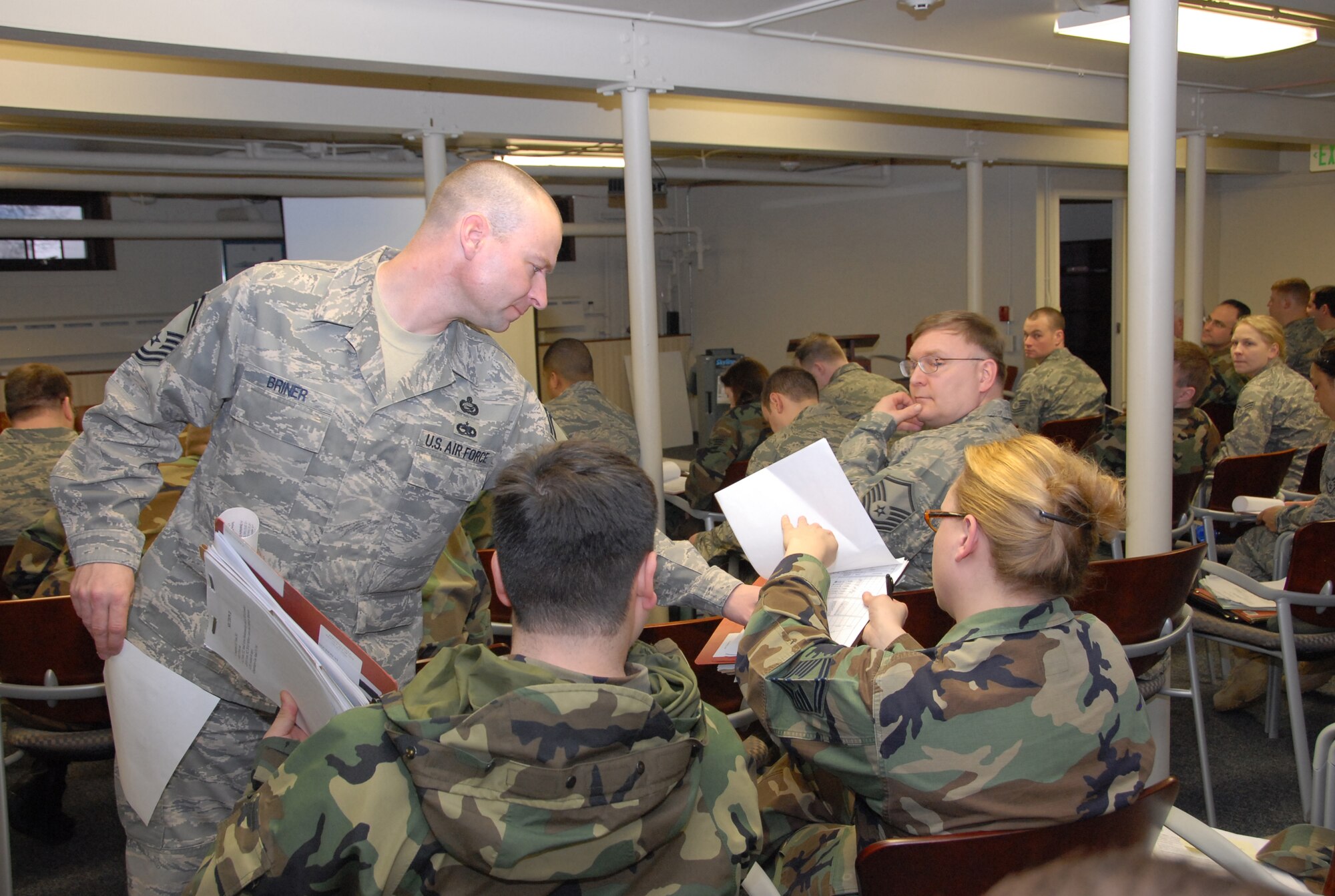 ELMENDORF AIR FORCE BASE, Alaska -- Senior Master Sgt. Gary Briner, 477th Force Support Squadron, performs final outprocessing procedures for the 477th Civil Engineer Squadron.  This is the first deployment for the 477 CES since World War II.  They are the only Air Force Reserve Civil Engineer Squadron in Alaska and are assigned to the 477th Fighter Group. (US Air Force Photo by Staff Sgt. Rhiannon Willard)