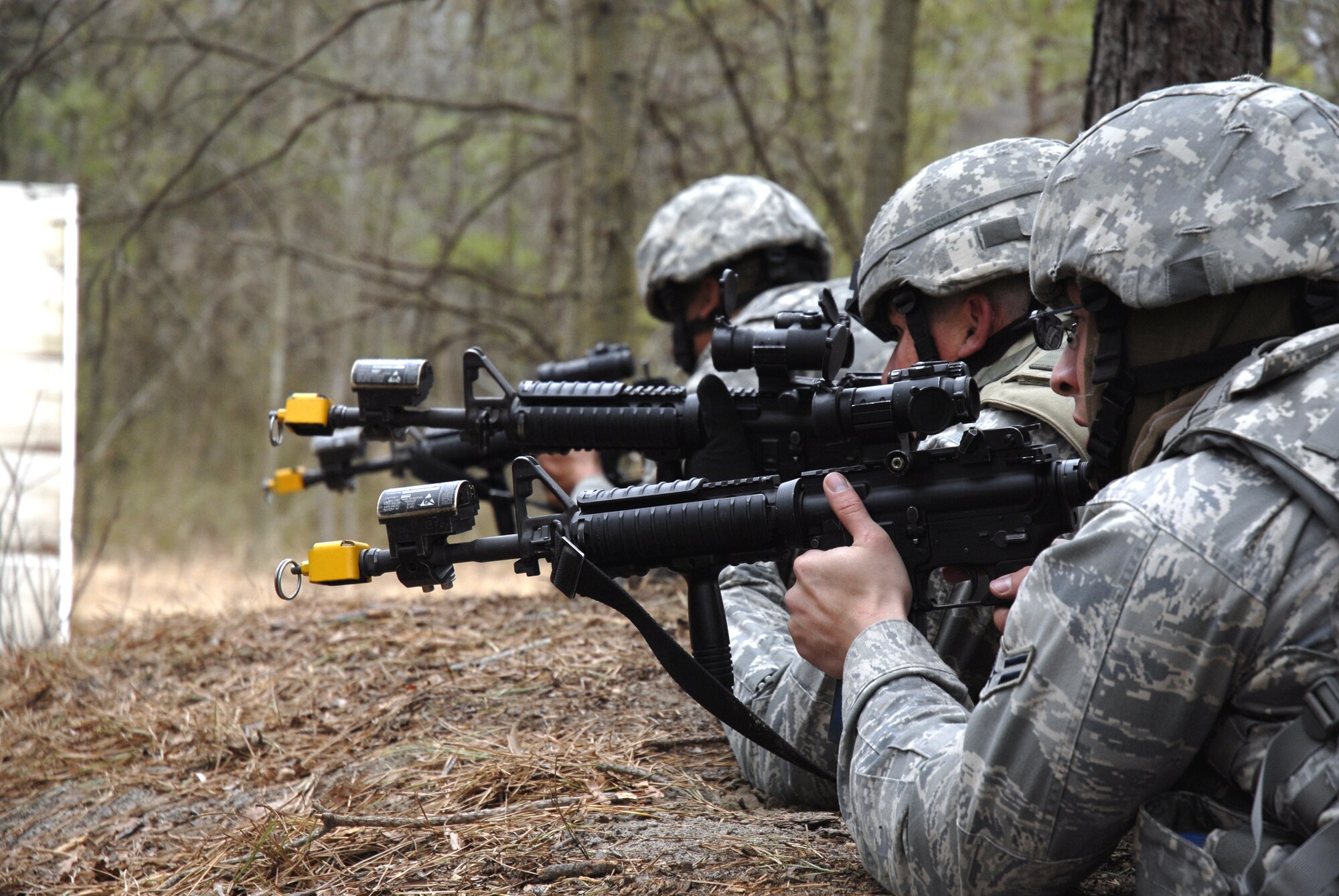 Students in the Air Force Phoenix Warrior Training Course practice combat first aid on a Fort Dix, N.J., range on Feb. 28, 2009.  The course, taught by the U.S. Air Force Expeditionary Center's 421st Combat Training Squadron at Fort Dix, N.J., prepares security forces Airmen for upcoming deployments.  (U.S. Air Force Photo/Staff Sgt. Paul R. Evans)