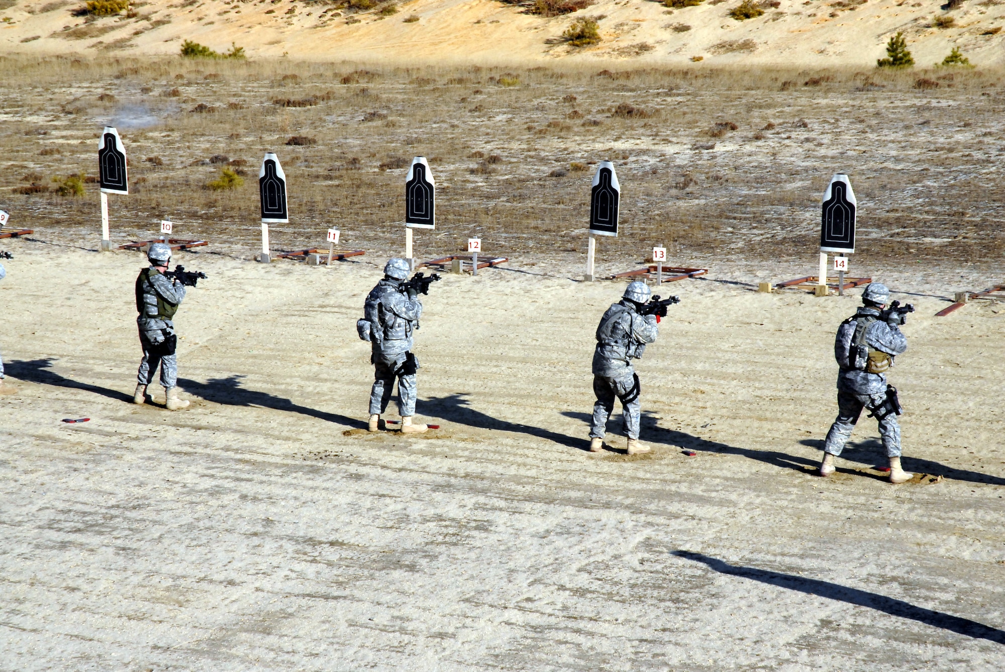 Students in the Air Force Phoenix Warrior Training Course practice live-fire training on a Fort Dix, N.J., range on Feb. 28, 2009.  The course, taught by the U.S. Air Force Expeditionary Center's 421st Combat Training Squadron at Fort Dix, N.J., prepares security forces Airmen for upcoming deployments.  (U.S. Air Force Photo/Staff Sgt. Paul R. Evans)