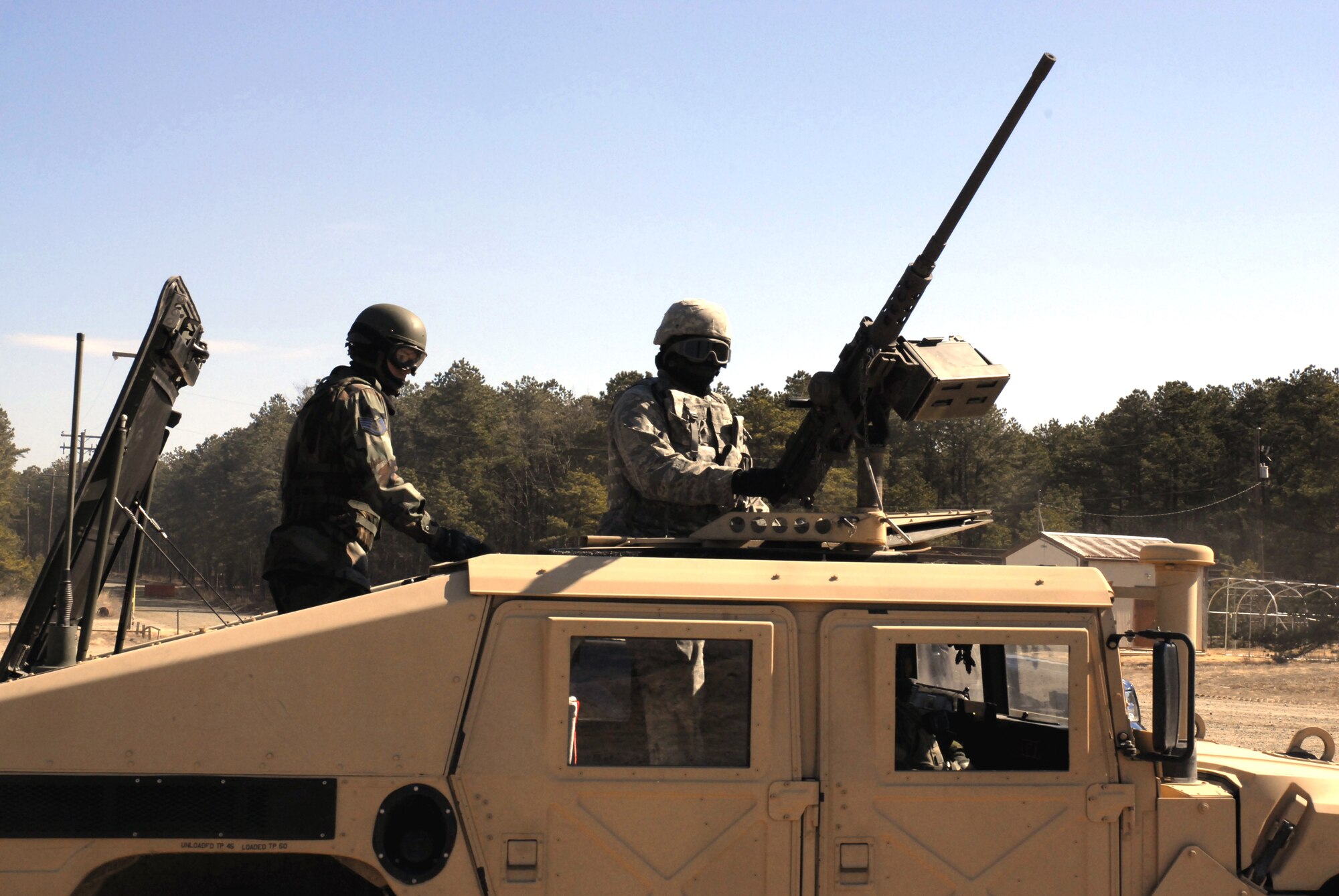 Students in the Air Force Phoenix Warrior Training Course prepare to move out for live-fire convoy operations training on a Fort Dix, N.J., range on Feb. 25, 2009.  The course, taught by the U.S. Air Force Expeditionary Center's 421st Combat Training Squadron at Fort Dix, N.J., prepares security forces Airmen for upcoming deployments.  (U.S. Air Force Photo/Staff Sgt. Paul R. Evans)