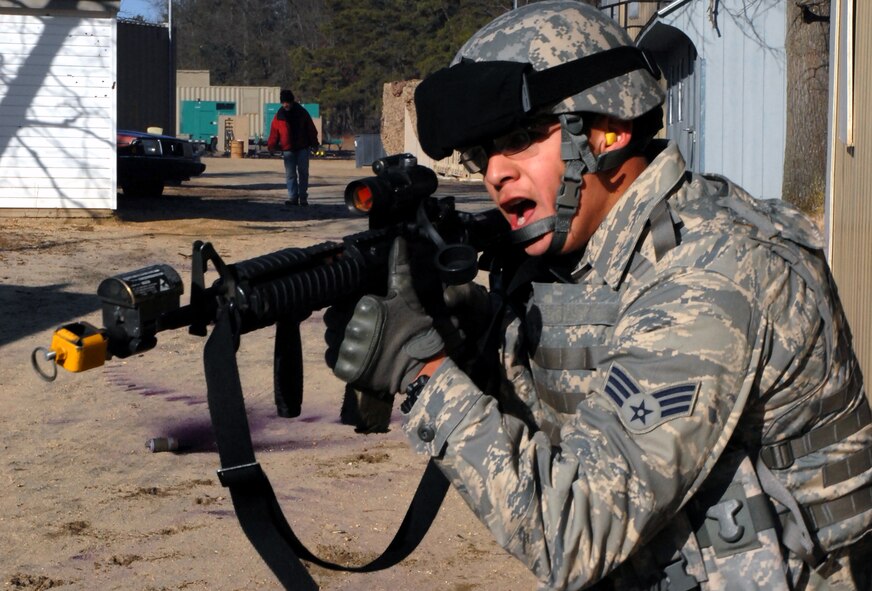 A student in the Air Force Phoenix Warrior Training Course practices tactics for military operations in urban terrain during training on Naval Air Engineering Station Lakehurst, N.J., on Feb. 23, 2009.  The course, taught by the U.S. Air Force Expeditionary Center's 421st Combat Training Squadron at Fort Dix, N.J., prepares security forces Airmen for upcoming deployments.  (U.S. Air Force Photo/Staff Sgt. Paul R. Evans)