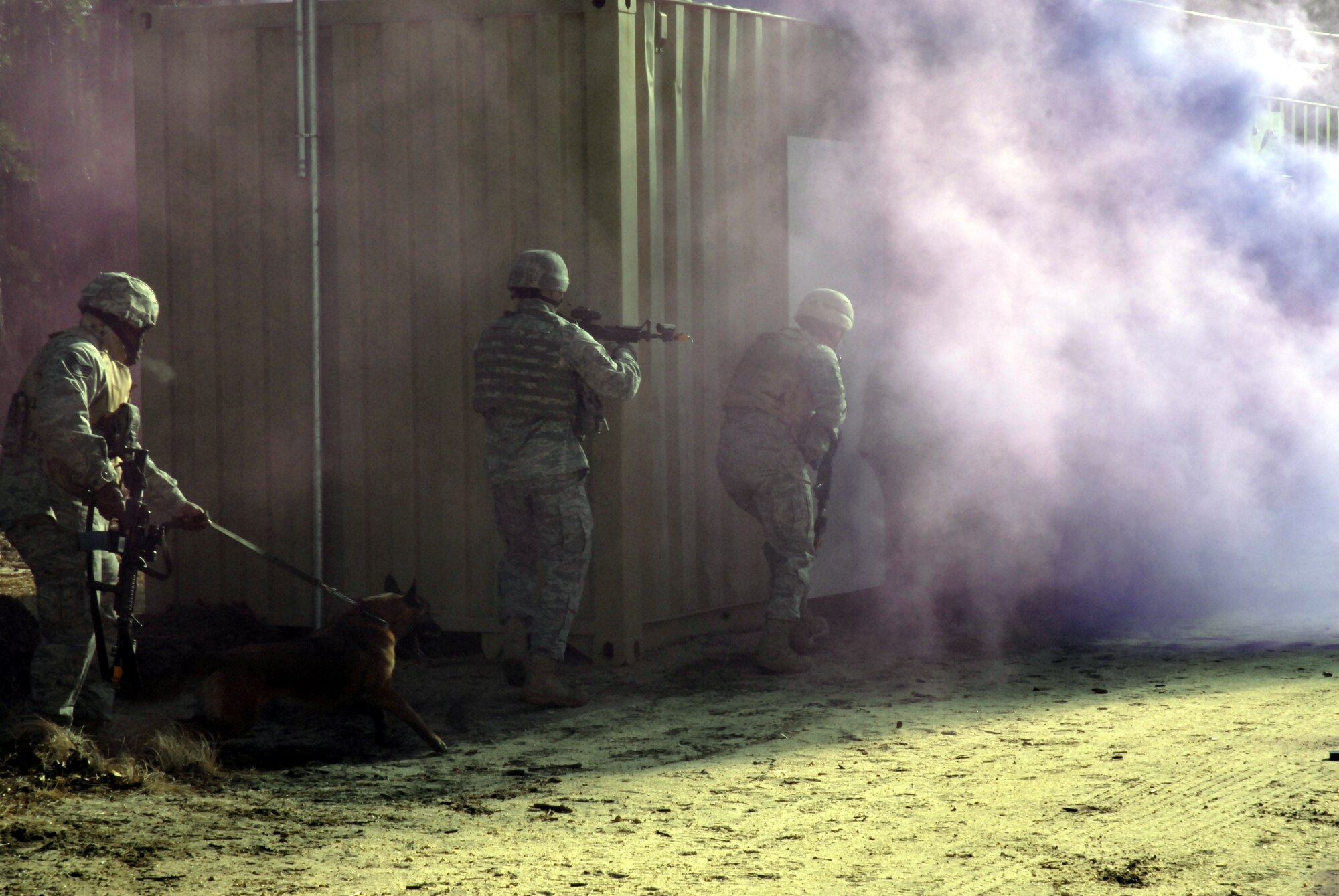 Students in the Air Force Phoenix Warrior Training Course practice tactics for military operations in urban terrain during training on Naval Air Engineering Station Lakehurst, N.J., on Feb. 23, 2009.  The course, taught by the U.S. Air Force Expeditionary Center's 421st Combat Training Squadron at Fort Dix, N.J., prepares security forces Airmen for upcoming deployments.  (U.S. Air Force Photo/Staff Sgt. Paul R. Evans)
