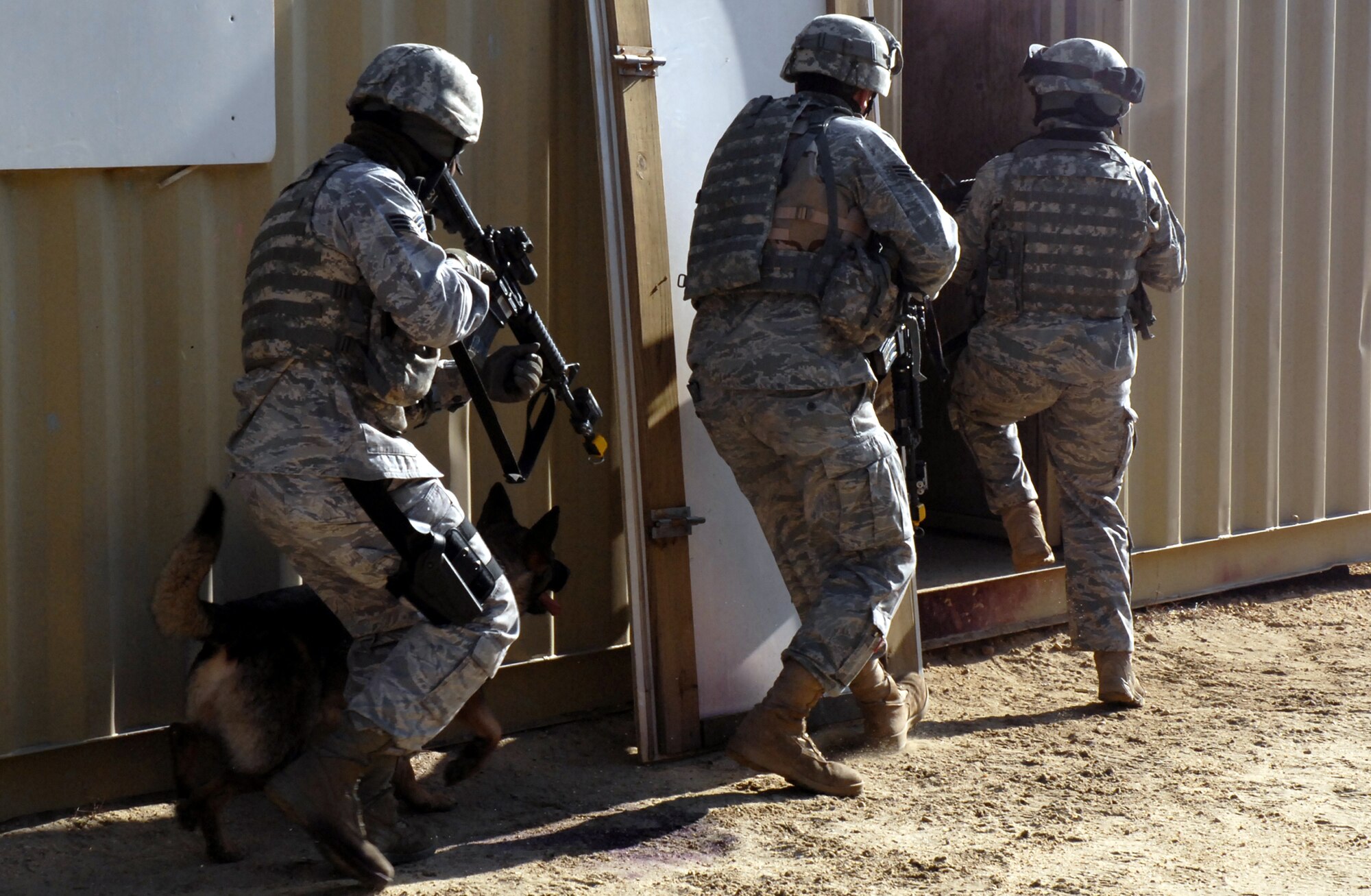 Students in the Air Force Phoenix Warrior Training Course practice tactics for military operations in urban terrain during training on Naval Air Engineering Station Lakehurst, N.J., on Feb. 23, 2009.  The course, taught by the U.S. Air Force Expeditionary Center's 421st Combat Training Squadron at Fort Dix, N.J., prepares security forces Airmen for upcoming deployments.  (U.S. Air Force Photo/Staff Sgt. Paul R. Evans)