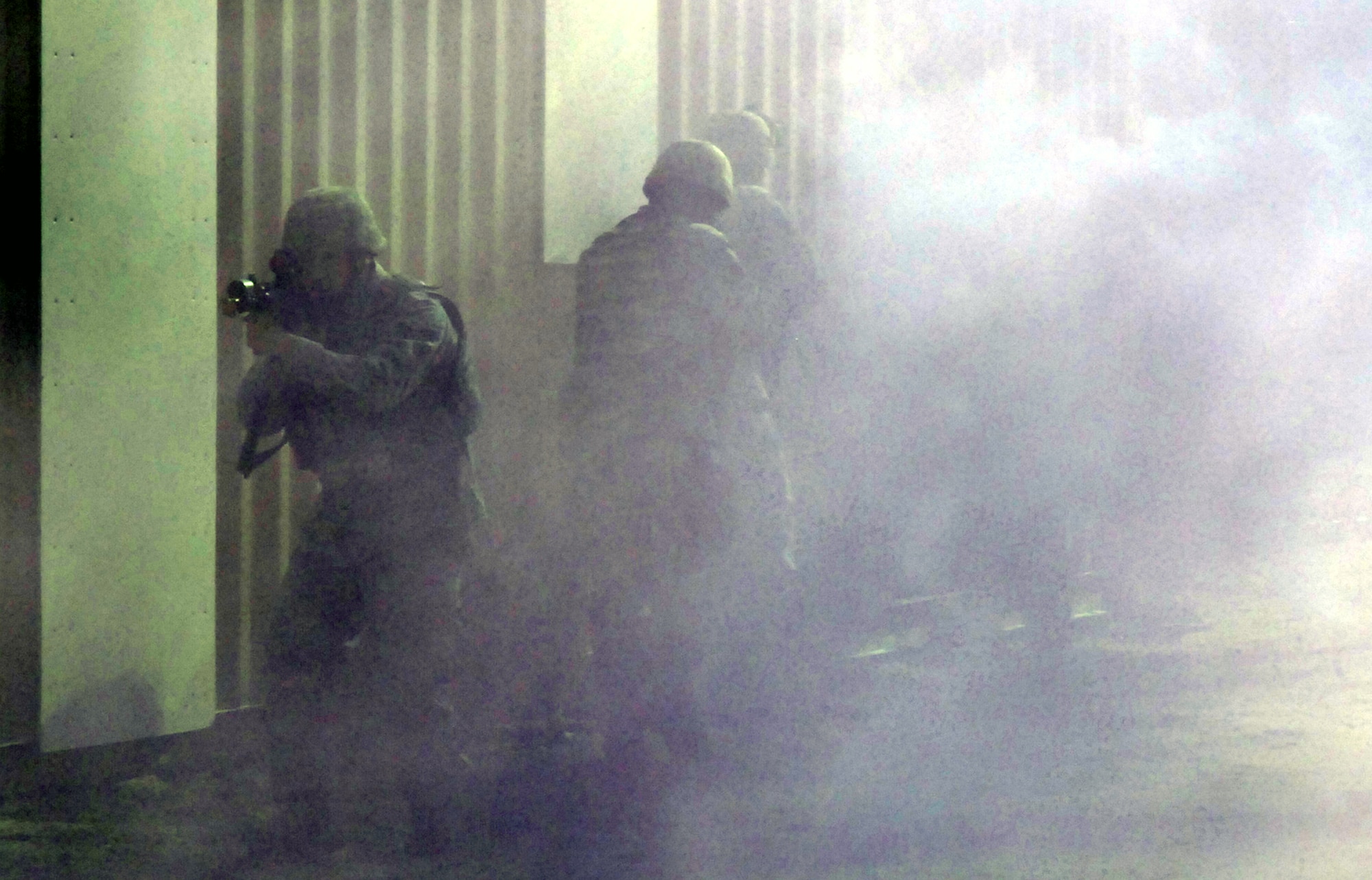 Students in the Air Force Phoenix Warrior Training Course practice tactics for military operations in urban terrain during training on Naval Air Engineering Station Lakehurst, N.J., on Feb. 23, 2009.  The course, taught by the U.S. Air Force Expeditionary Center's 421st Combat Training Squadron at Fort Dix, N.J., prepares security forces Airmen for upcoming deployments.  (U.S. Air Force Photo/Staff Sgt. Paul R. Evans)