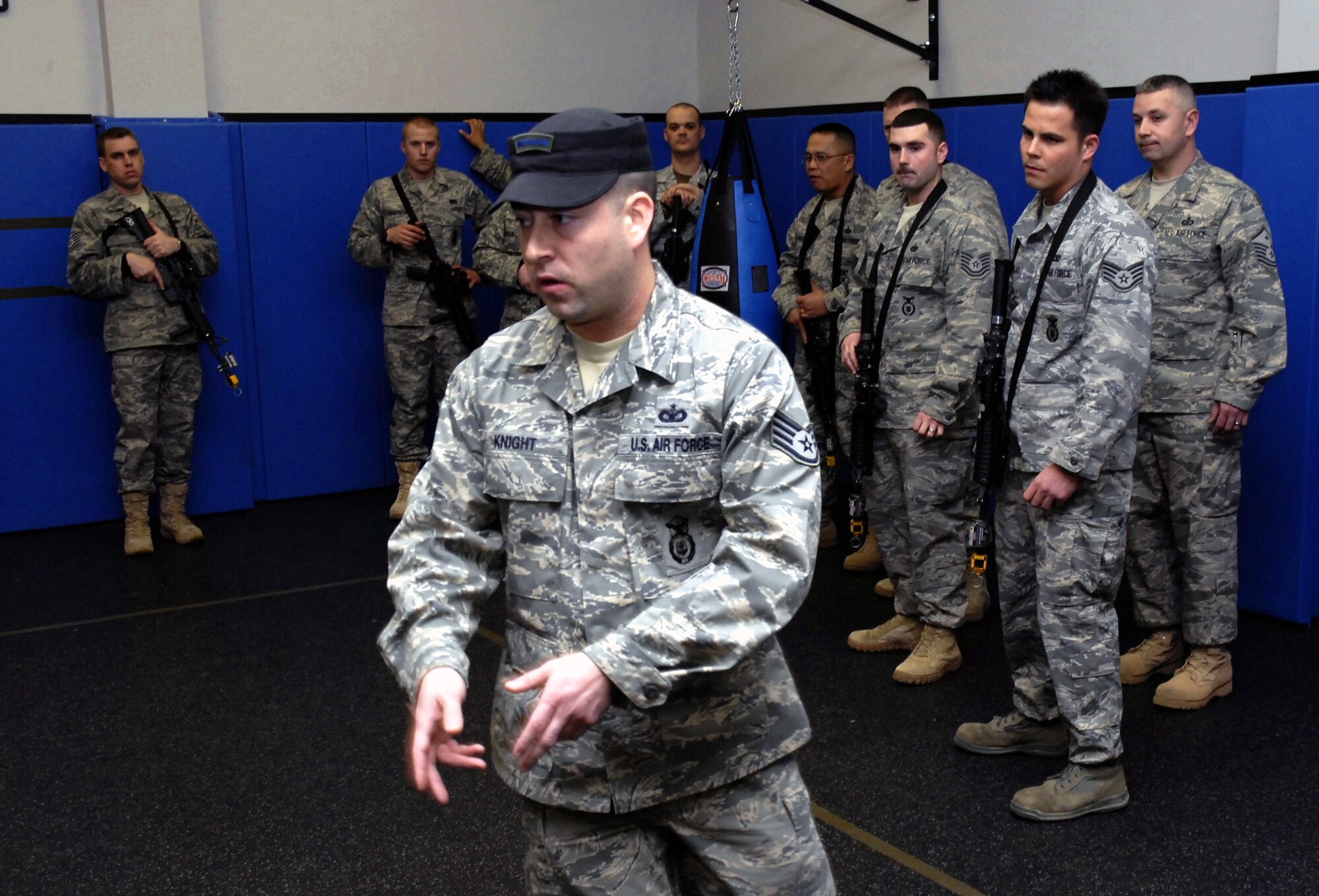 Staff Sgt. Jeffrey Knight, instructor from the 421st Combat Training Squdron, demonstrates room clearing procedures to students from the U.S. Air Force Expeditionary Center's Air Force Phoenix Warrior Training Course on Fort Dix, N.J., on Feb 23, 2009. Phoenix Warrior is a pre-deployment training coures for security forces Airmen. (U.S. Air Force Photo/Staff Sgt. Paul R. Evans)