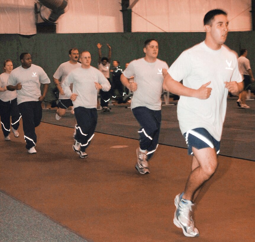 Members of Team Andrews run in the newly renovated Tactical Fitness Center in the West Fitness Center. The center gives members a variety of things to do to include P90X, CrossFit, baseketball and volleyball. (US Air Force photo by Bobby Jones)