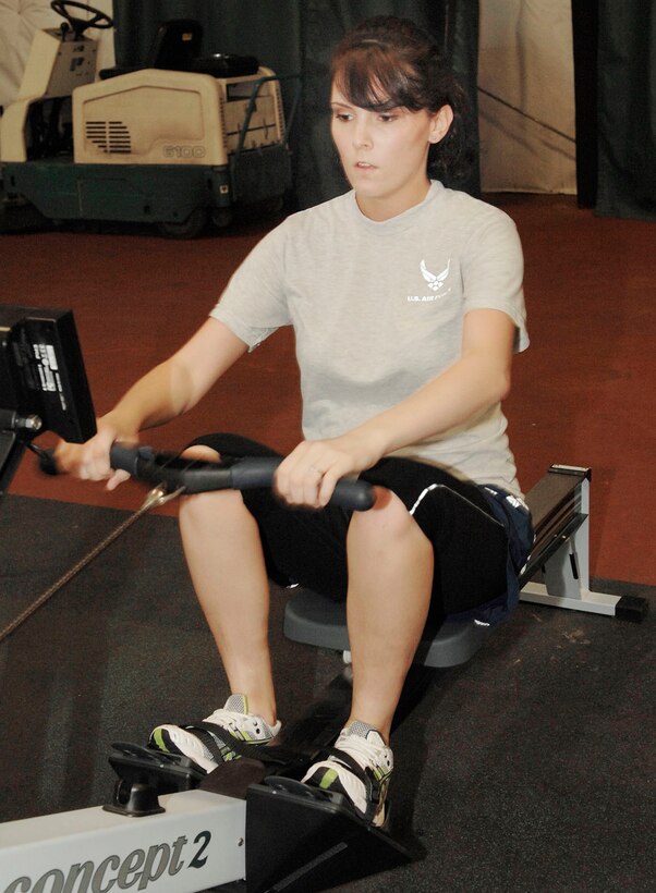 Airman 1st Class Carlee McKoy, 779th Surgical Squadron medical technician, uses a rowing machine at the Tactical Fitness Center Feb 18. (US Air Force photo by Bobby Jones)