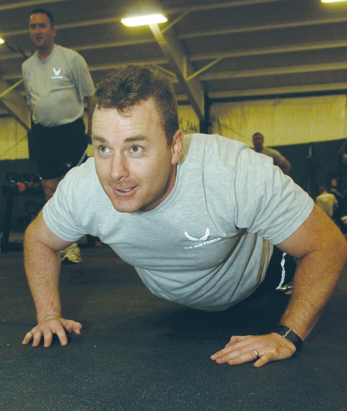 Lieutenant Col. Burke Beaumont, 316 CPTS commander, performs a push-up during CrossFit training Feb 18. CrossFit has been available to Andrews personnel since January 2009, when the Tactical Fitness Center opened. (US Air Force photo by Bobby Jones)