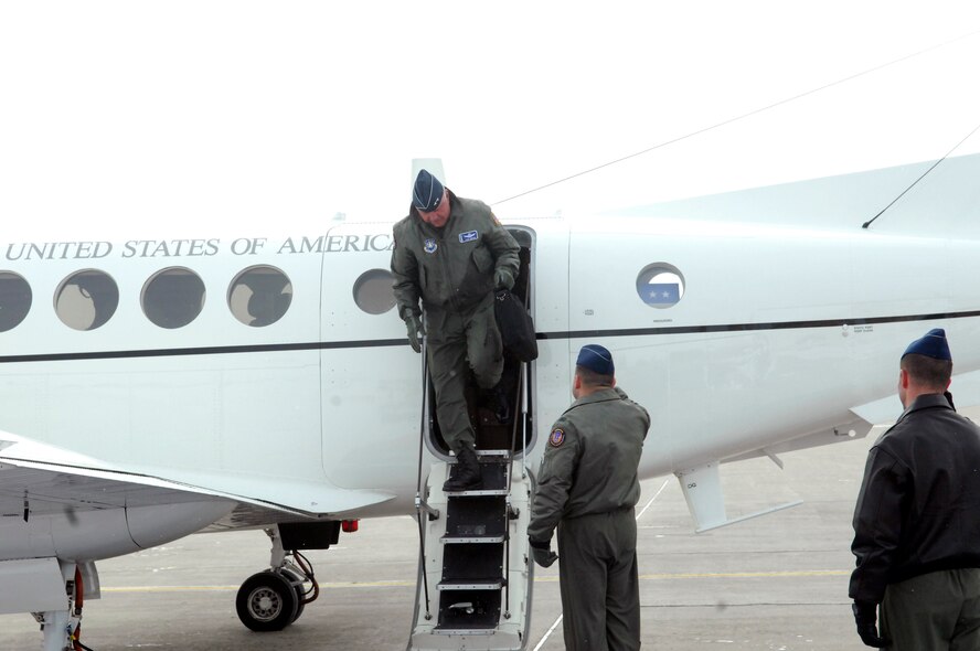 MINOT AIR FORCE BASE, N.D. -- Col. Christopher Ayres, 91st Missile Wing commander, salutes Maj. Gen. Thomas Deppe, Air Force Space Command vice commander, as he braves the cold and begins his visit here Feb. 26 to 28. General Deppe came here to boost morale, meet his Airmen and reinforce the importance Rough Riders have in sustaining a successful nuclear enterprise. (U.S. Air Force photo by Staff Sgt. Keith Ballard)