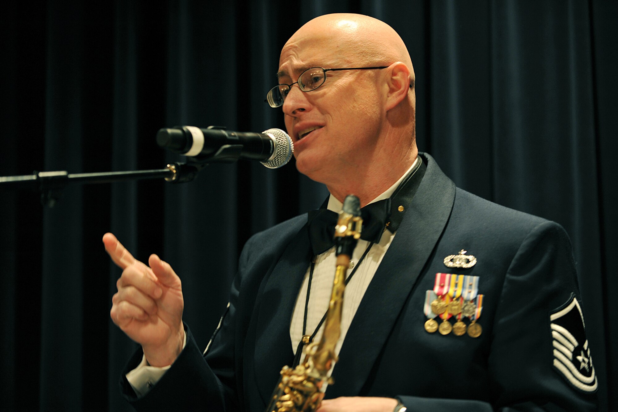 OFFUTT AIR FORCE BASE, Neb., -- Master Sgt. James Joyce, non-commissioned officer in charge of the Heartland of American Band, entertains the crowd during the 55th Wing Annual Awards Banquet held at the Patriot Club Feb. 27. Members of the 55th Wing came together to honor those who have demonstrated tireless dedication, faithful service and excelled in the past year representing the best of the best according to the general.

U.S. Air Force Photo By Charles Haymond