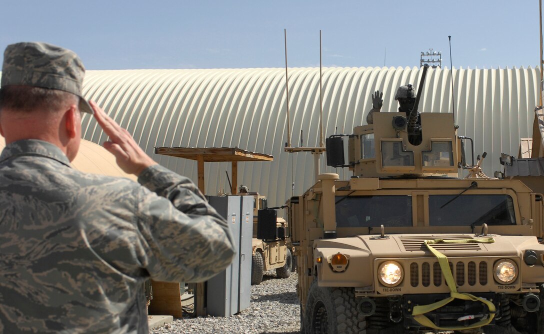 Brig. Gen. Dana Simmons, Air Force Office of Special Operations Investigations commander, salutes an Airmen at Bagram Air Field, Afghanistan, recently. The General visited BAF to speak with Airmen and Department of Defense civilians contributing to the mission in Afghanistan. (U.S. Air Force photo/Senior Airman Erik Cardenas)