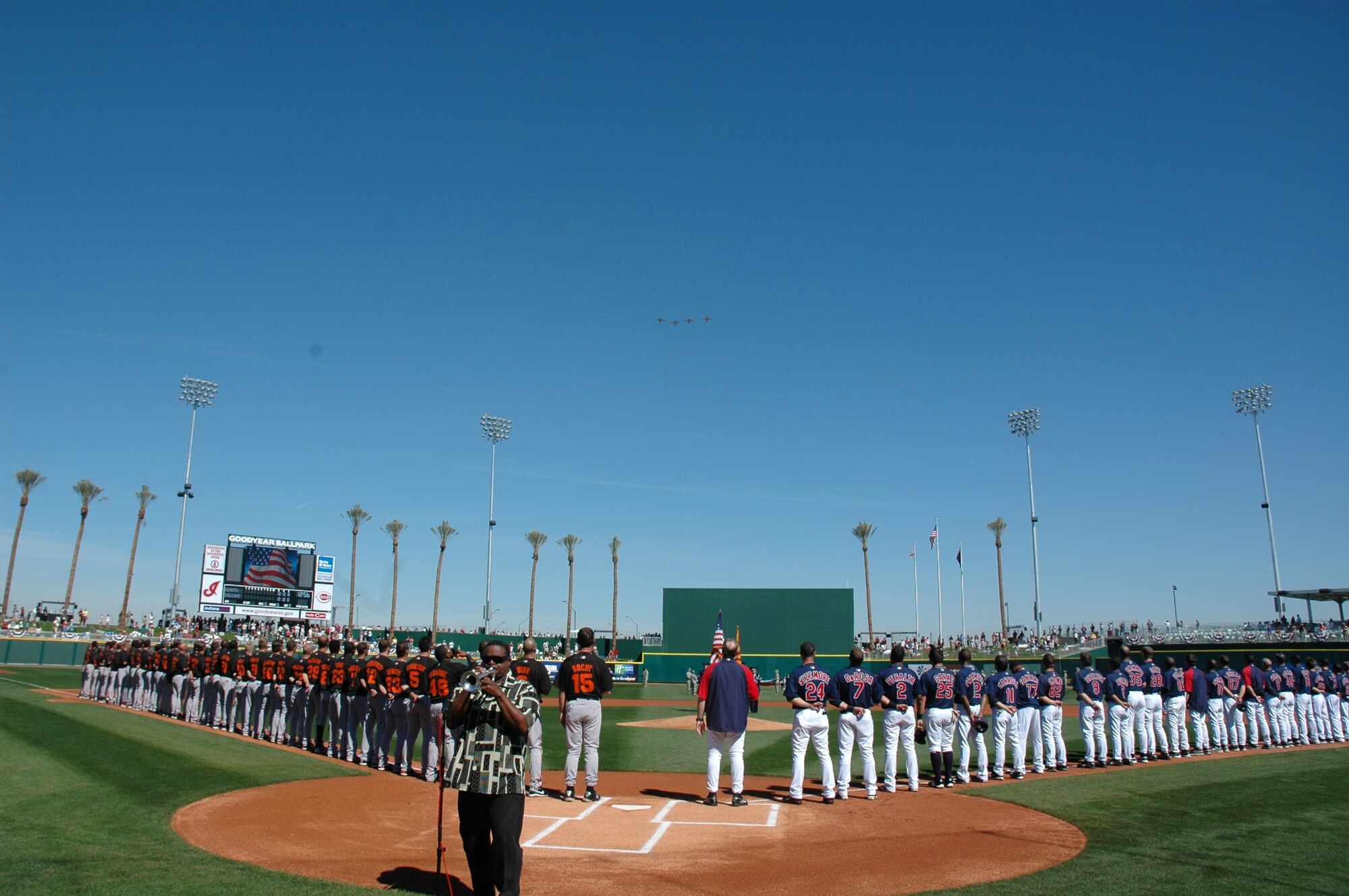 The 62nd Fighter Squadron flies over the Goodyear Ballpark Feb. 25 during opening ceremonies of Military Appreciation Day. The Cleveland Indians' kicked off their inaugural spring training season in Arizona by recognizing area military members. In addition to the flyover, servicemembers from Luke Air Force Base, Ariz., held red, white and blue stars during the opening ceremony. The Luke AFB Honor Guard also presented the colors while Dr. Jesse McGuire, a Phoenix native, played the National Anthem on the trumpet. (U.S. Air Force photo/Tech. Sgt. Susan Stout) 