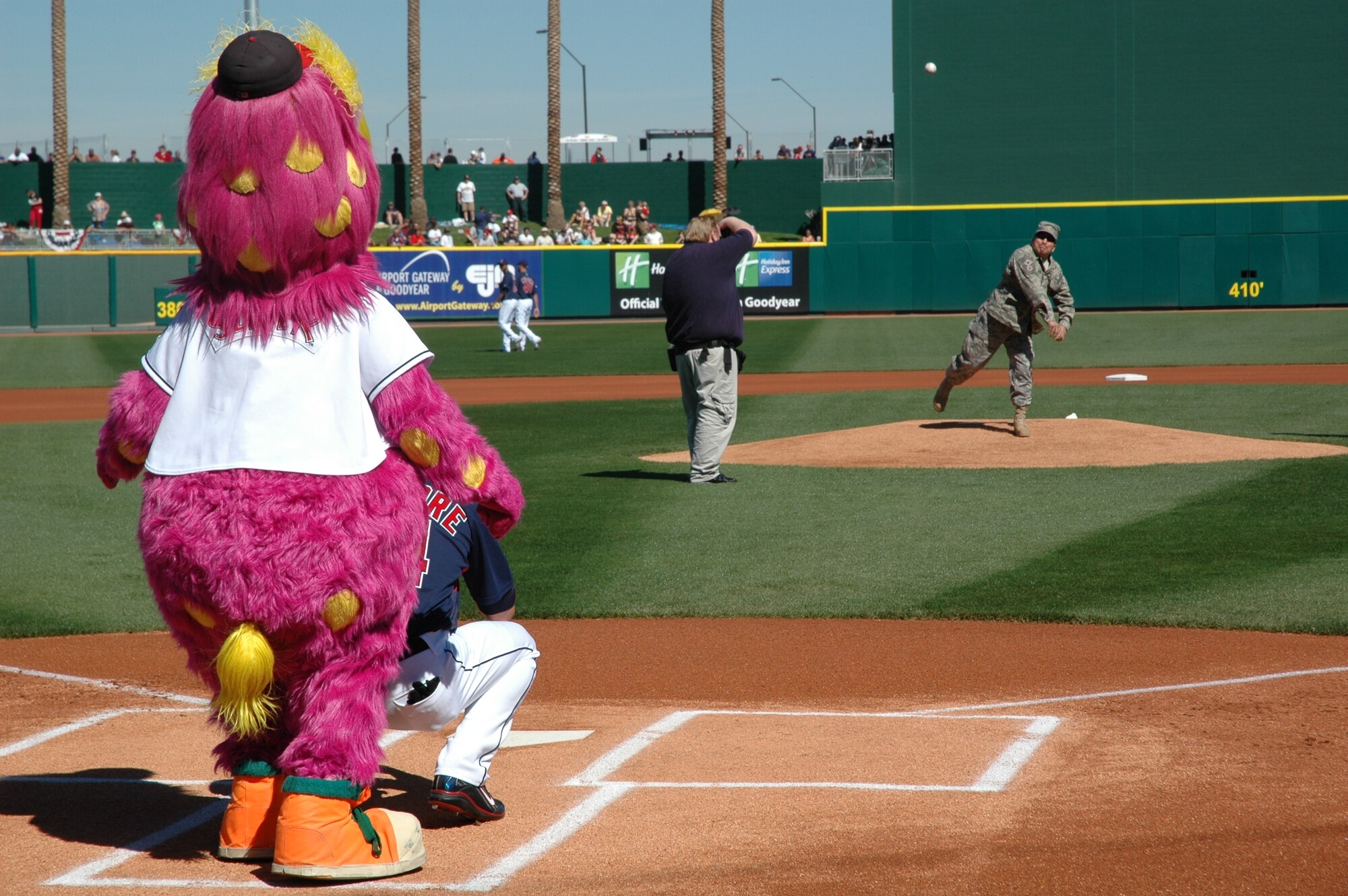 Chief Master Sgt. Pablo Valverde, 944th Fighter Wing command chief, throws the first pitch Feb. 25 during Military Appreciation Day at the Goodyear Ballpark in Goodyear, Ariz. The Cleveland Indians' kicked off their inaugural spring training season in Arizona by recognizing area military members. (U.S. Air Force photo/Tech. Sgt. Susan Stout) 