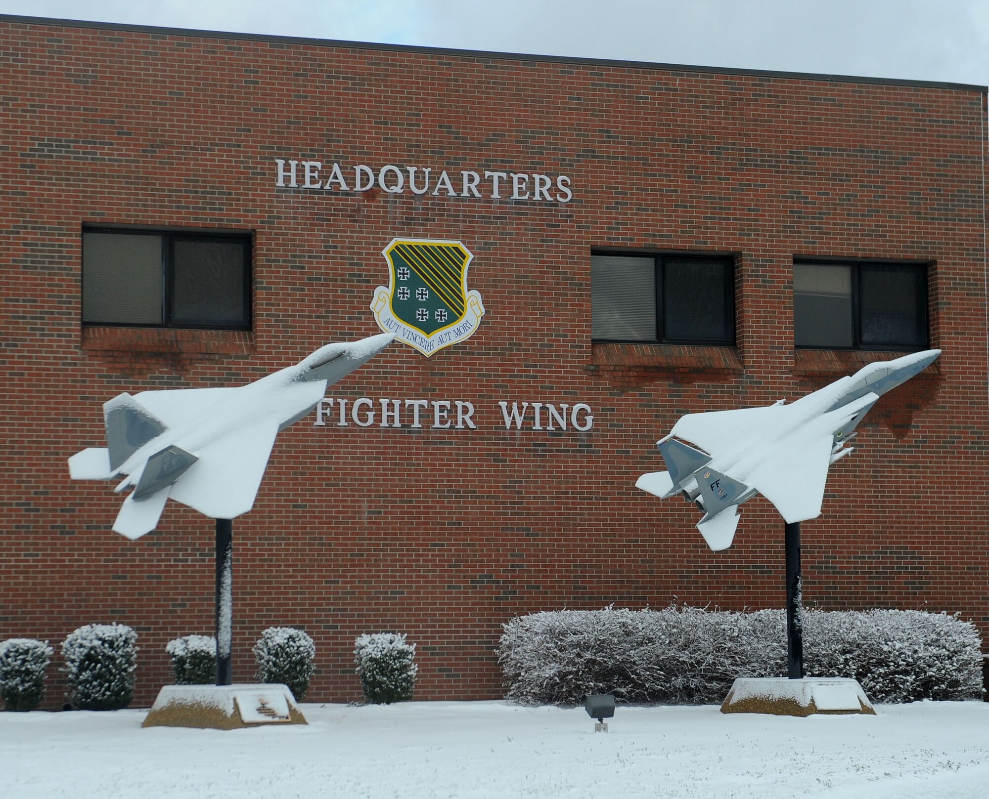LANGLEY AIR FORCE BASE, Va.-- The static displays outside the 1st Fighter Wing Headquarters building are seen covered with snow after a snowstorm March 2. Langley was hit with parts of the largest  snowfall Virginia has seen in the last three years. (U.S. Air Force photo/Airman Rebecca Montez)