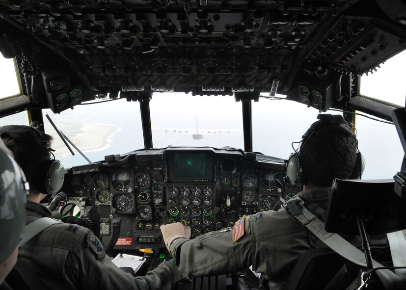 KADENA AIR BASE, Japan -- Capts. Jamie Rademacher and Jeremy Anderson, both 17th Special Operations Squadron pilots, follow another MC-130P Combat Shadow during a formation, low-level training mission here March 2. The primary mission of the 17th SOS is to aerial refuel special operations helicopters, but it is also capable of day and night low-level delivery of troops and equipment via airdrop or airland operations. (U.S. Air Force photo by Tech. Sgt. Aaron Cram)