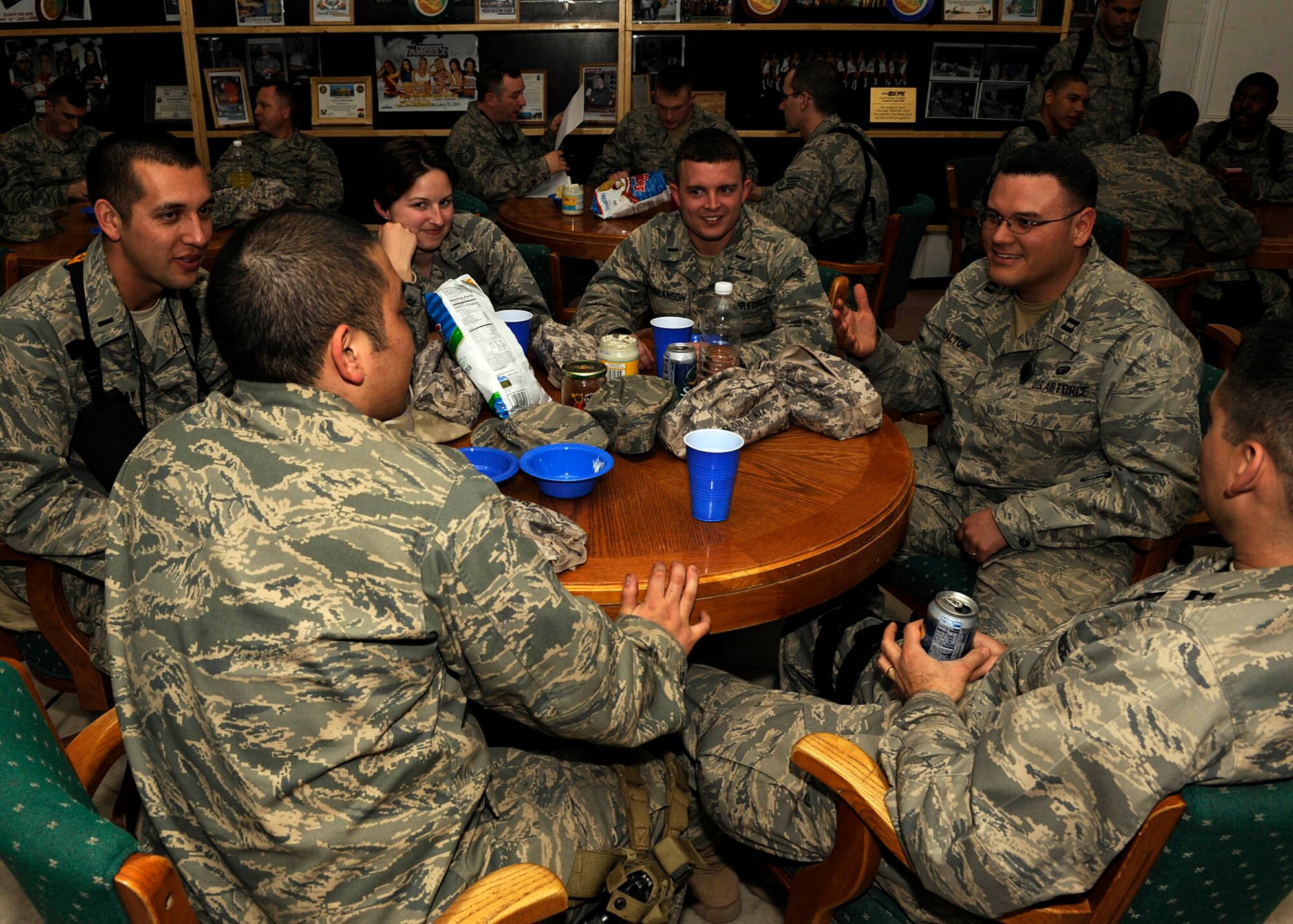 Chaplain (Capt.) David Haltom, 732nd Air Expeditionary Group chaplain, provides spiritual guidance to a group of Joint Expeditionary Tasked Airmen at Camp Slayer. As one of the only ‘combat’ chapel teams, Chaplain Haltom and Staff Sgt. Porscha Howard, the chapel team for the 732nd AEG, provide chapel support to Joint Expeditionary Tasked Airmen, who are filling Army positions in unique locations. (U.S. Air Force photo by Senior Airman Jacqueline Romero)