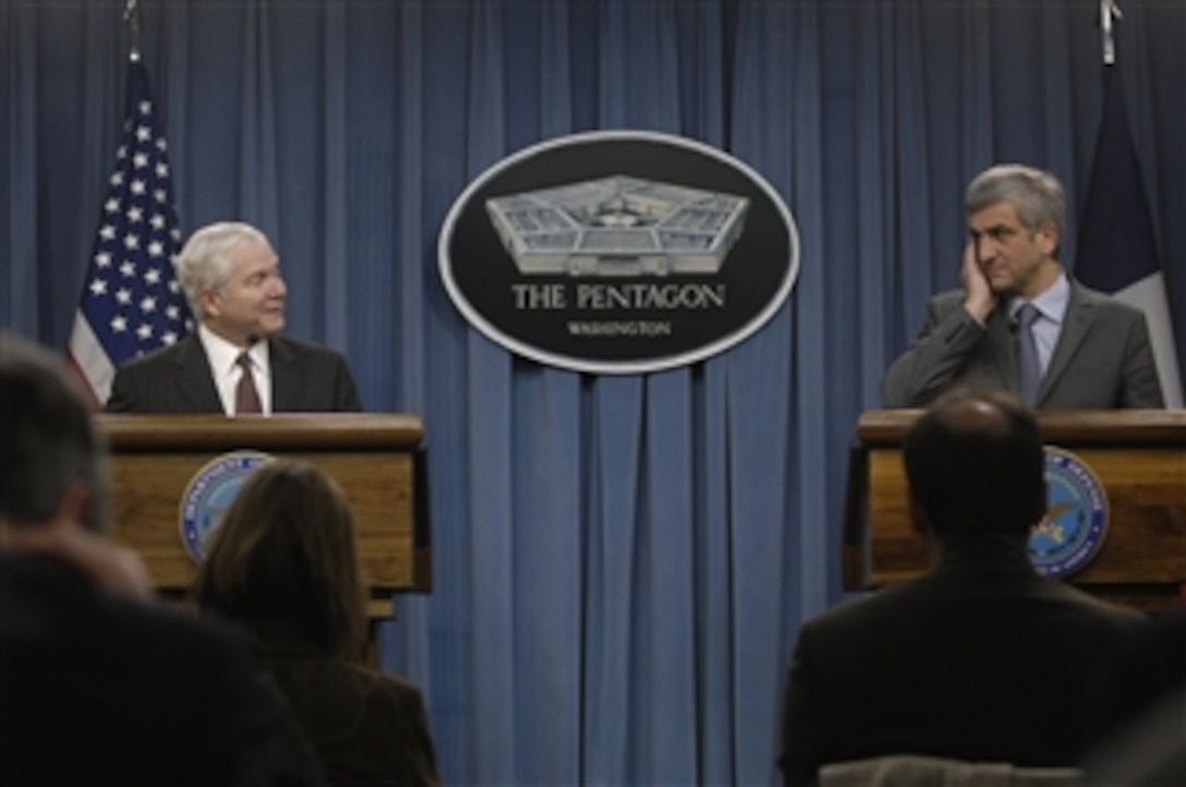 Secretary of Defense Robert M. Gates (left) and French Minister of Defense Herve Morin answer questions from reporters during a press briefing in the Pentagon on March 3, 2009.  