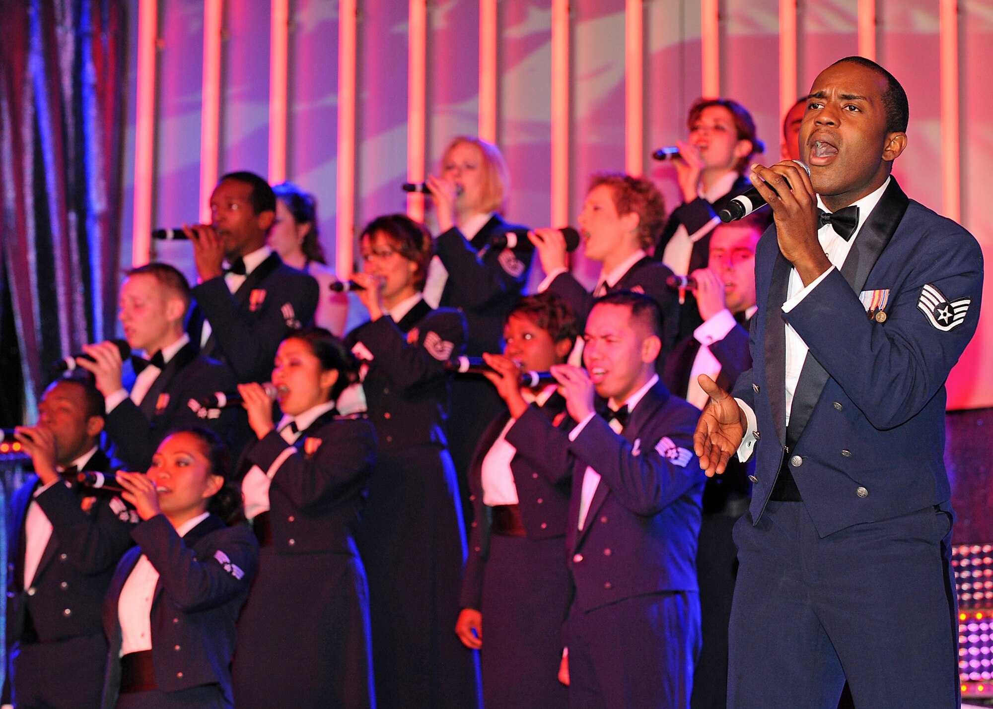 Tops In Blue singer Staff Sgt. Corey Sims from Luke Air Force Base, Ariz., performs a solo during the Air Force Ball held at the Broadmoor in Colorado Springs Feb. 27. Tops In Blue unit goal is to enhance mission productivity for Air Force members and their families.
