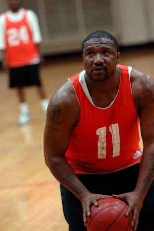 Thomas Shider shoots a free throw during an intramural basketball game at the Fitness and Sports Center here March 3. The Army National Guard team defeated the Logistics Readiness Squadron 45-37. Shider is with the Army National Guard in Charleston, South Carolina. (U.S. Air Force photo/Senior Airman Timothy Taylor)