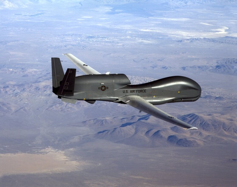 An RQ-4 Global Hawk soards through the skies in route to record intelligence, surveillence and reconnaissance data. Because of its large coverage area the Global Hawk has become a useful tool for recording data and sending it to warfighters on the ground. (Courtesy Photo)