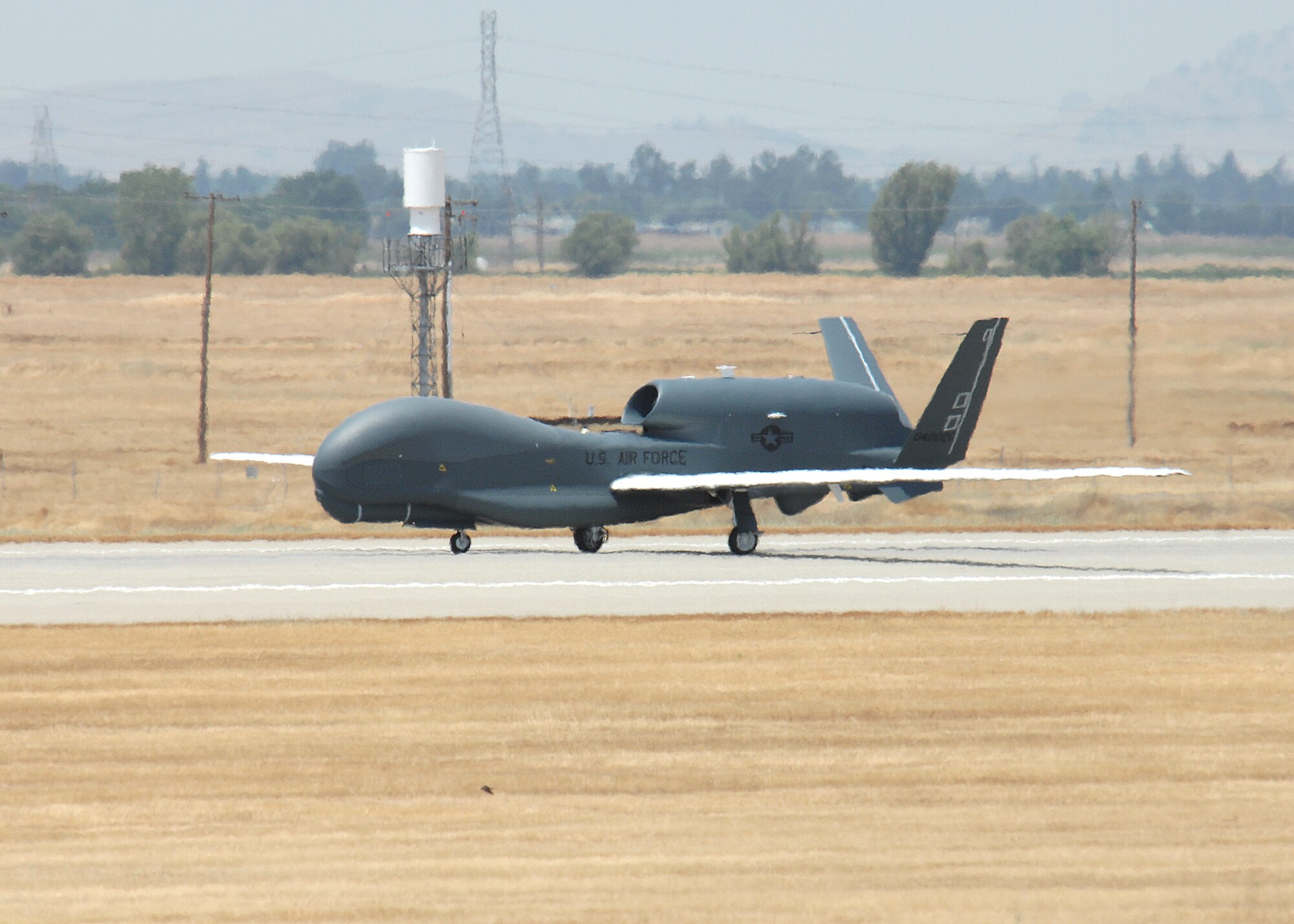 A Block 20, RQ-4 Global Hawk arrives for the first time June 30, 2008 at Beale where it will be stationed. The Block 20 model replaces the older Block 10 aircraft which has been in service since the beginning of the Global Hawk program. (Photo by John Schwab)