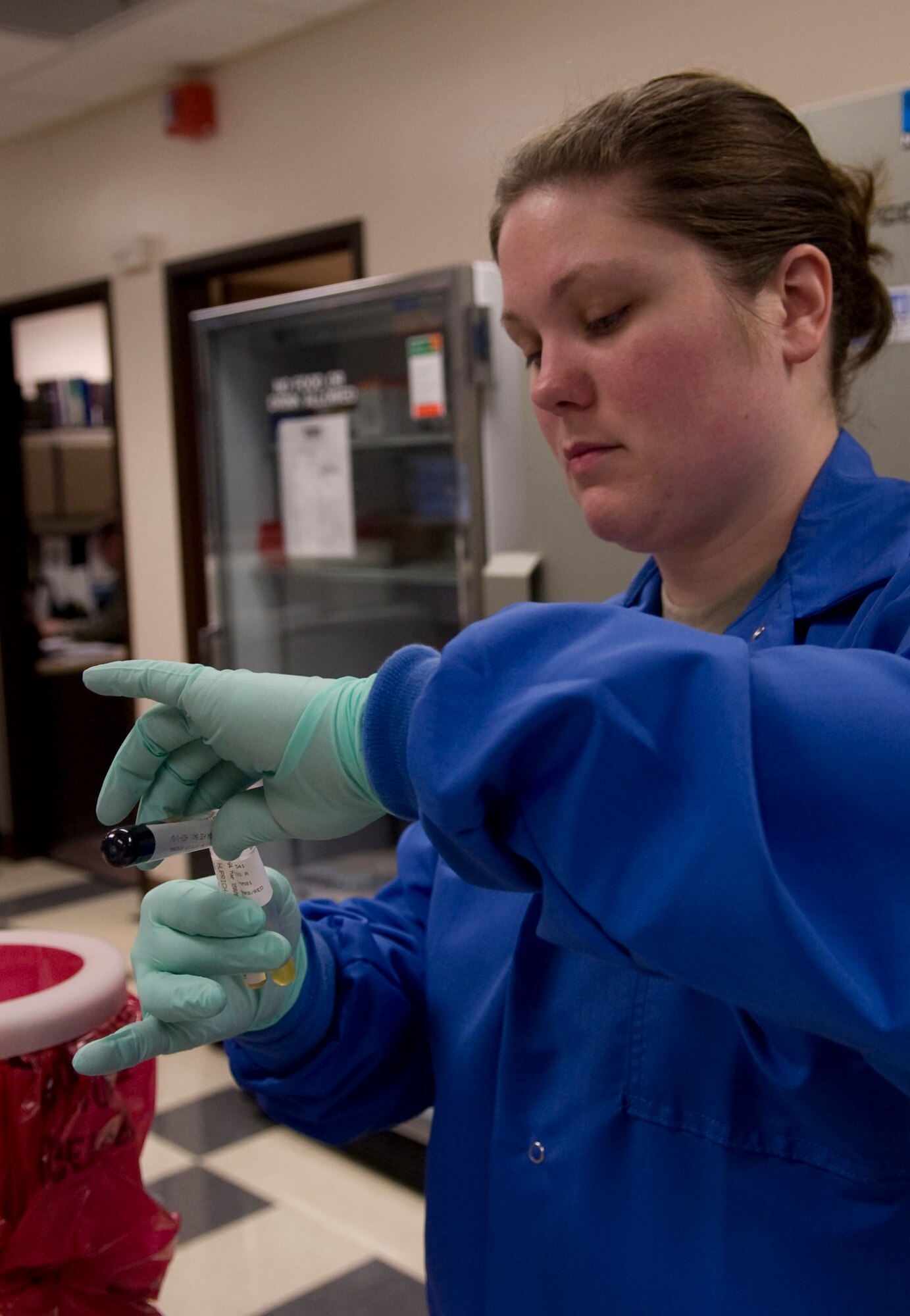 Staff Sgt. Toni Thompson, 354th Medical Group clinical lab technician, prepares specimens to be sent out March 4, 2009, Eielson Air Force Base, Alaska. Blood work must sometimes be transferred to another tube to be shipped to a larger lab for more complex testing. (U.S. Air Force photo/Airman 1st Class Laura Max)