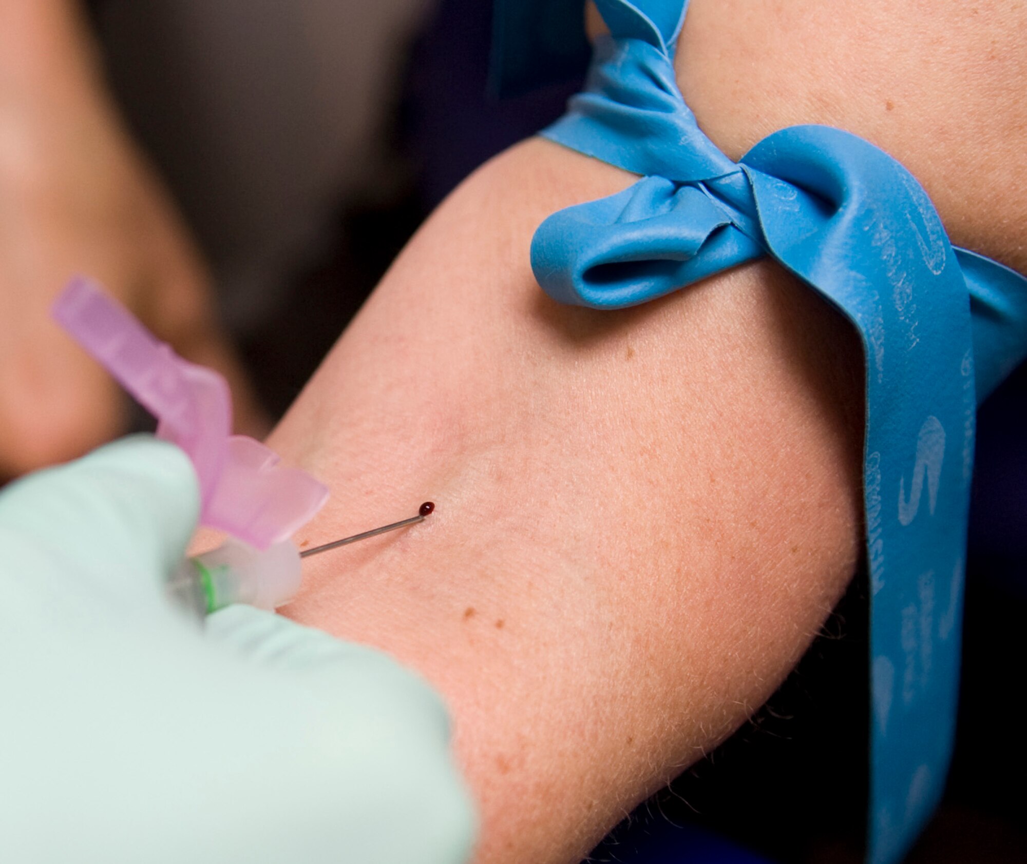 Staff Sgt. Karla Workman, 354th Medical Group clinical lab technician draws blood from a patient March 4, 2009, Eielson Air Force Base, Alaska. Routine chemistry and complete blood count labs are drawn to ensure healthy blood in the body. (U.S. Air Force photo/Airman 1st Class Laura Max)