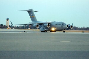 Brig. Gen. Kenneth Merchant delivers Charleston AFB's newest C-17 March 3. The P-184 C-17 is the fourth of 10 new aircraft Charleston AFB is scheduled to receive this year. General Merchant is the director of logistics for Air Mobility Command. (U.S. Air Force photo/Staff Sgt. Marie Cassetty) 
