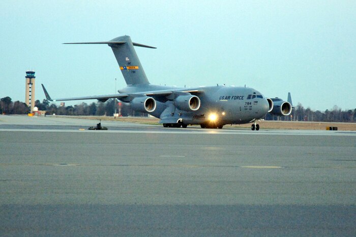 Brig. Gen. Kenneth Merchant delivers Charleston AFB's newest C-17 March 3. The P-184 C-17 is the fourth of 10 new aircraft Charleston AFB is scheduled to receive this year. General Merchant is the director of logistics for Air Mobility Command. (U.S. Air Force photo/Staff Sgt. Marie Cassetty) 
