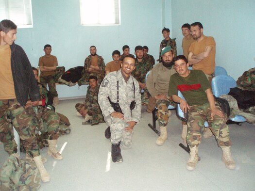 Master Sgt. Dewane Brown, Afghan National Army Medical Embedded Training Team member and combat advisor, takes a break with his local host nation counterparts. Sergeant Brown is deployed from Ellsworth and embedded with the Army at a forward operating base close to the Pakistani border. His duties include daily interaction with the ANA forces as they continue to free Afghanistan from the Taliban’s influence. A medical supply specialist by trade, Sergeant Brown is a key player in modernizing the Afghani hospital supply system within his area of operations. (Courtesy photo by Mr. Doust Mohammed)