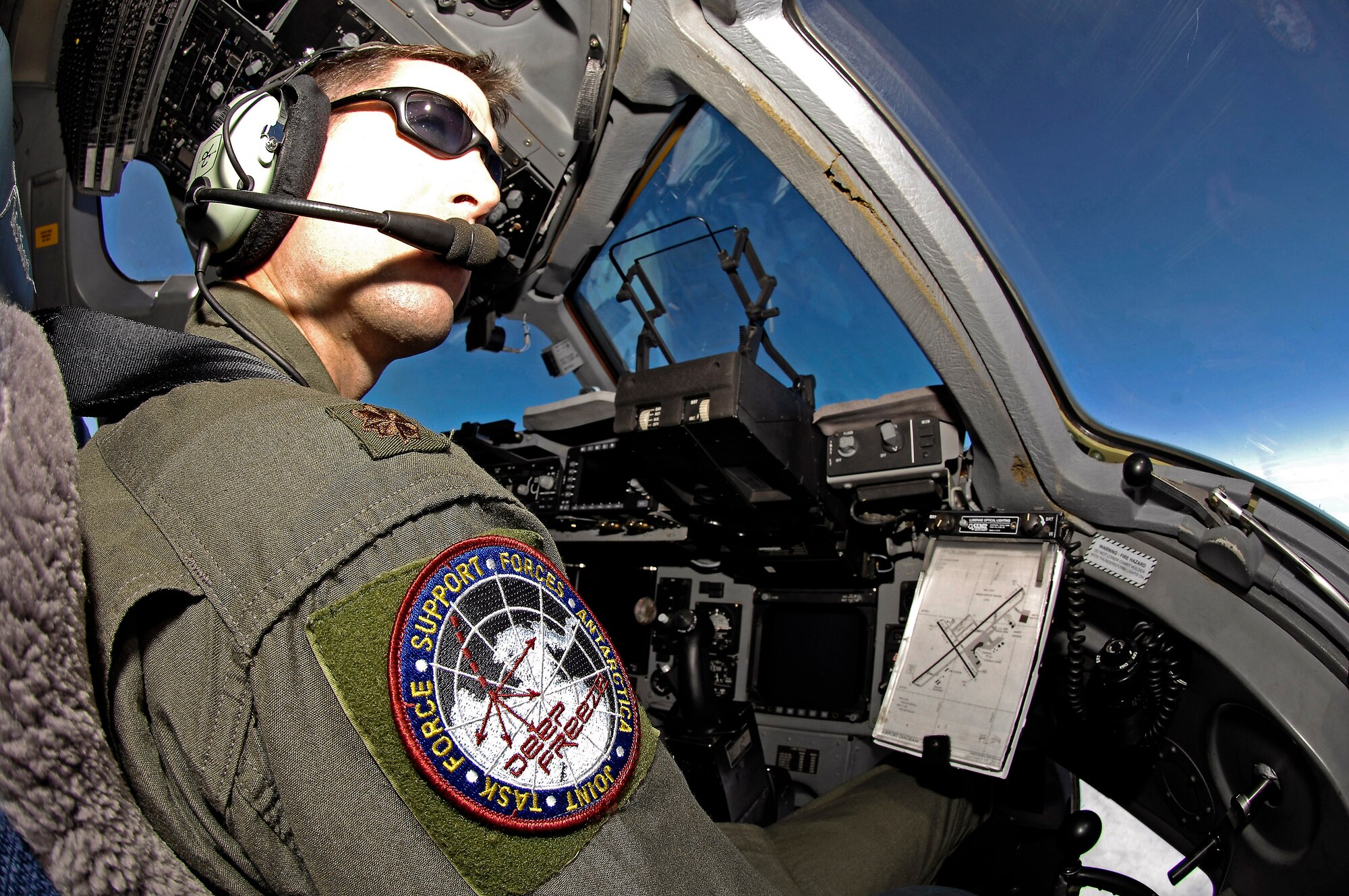 Maj. Jason Allen looks out over the Antarctic ice during the 2008-2009 Operation Deep Freeze season, which came to an end Feb. 28. Major Allen is a Reserve C-17 evaluator pilot with the 97th Airlift Squadron at McChord Air Force Base, Wash. (U.S. Air Force photo/Master Sgt. Chris Vadnais)