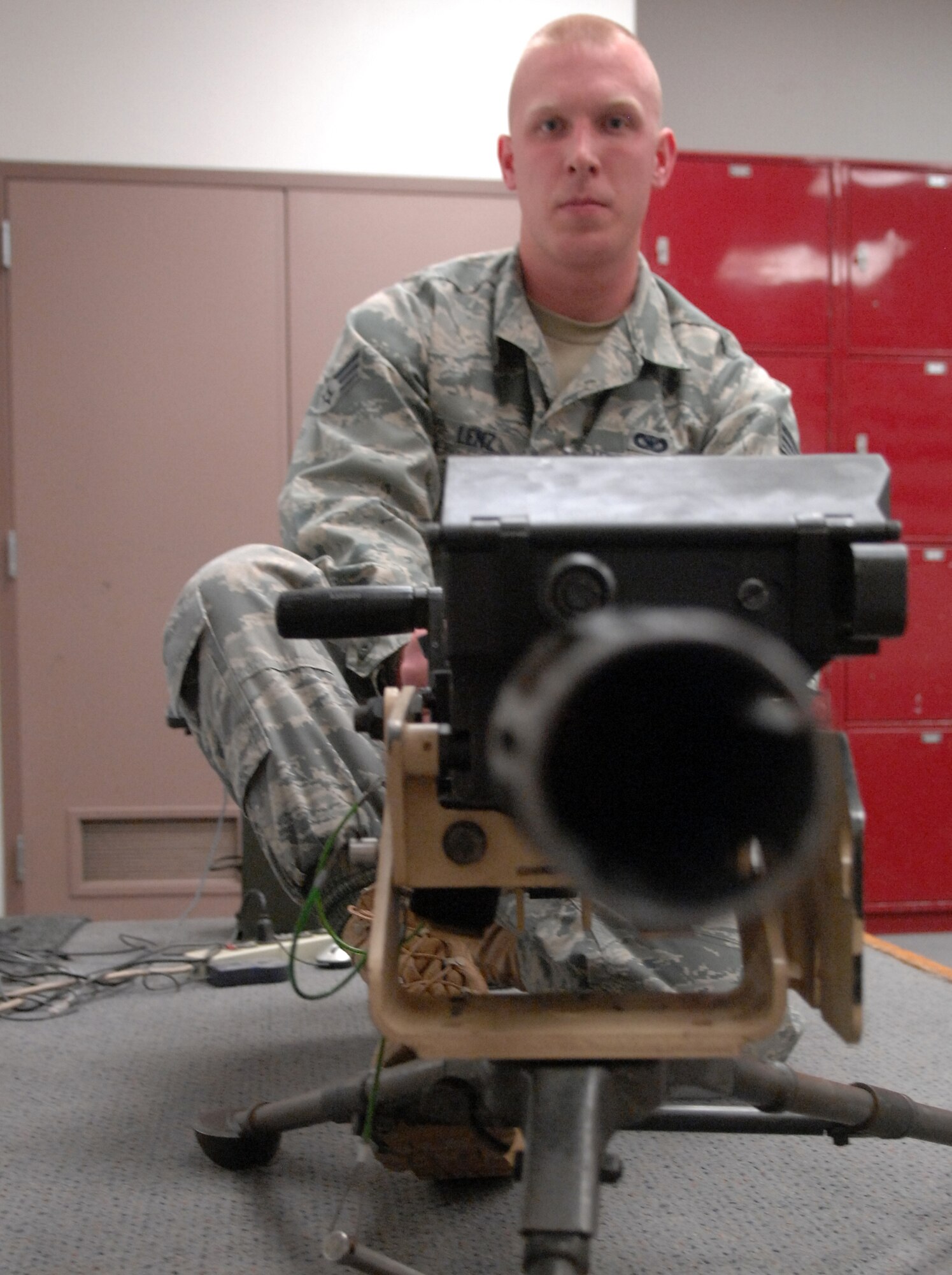 WHITEMAN AIR FORCE BASE, Mo. – Senior Airman Gregory Lenz, 509th Security Forces Squadron, dry fires a MK-19 during familiarization training Feb. 27. The MK-19 Automatic Grenade Launcher or Machine Gun is a self powered, air-cooled, belt-fed, blowback operated, crew-served weapon used by the Air Force during deployments. (U.S. Air Force photo/Senior Airman Stephen Linch)