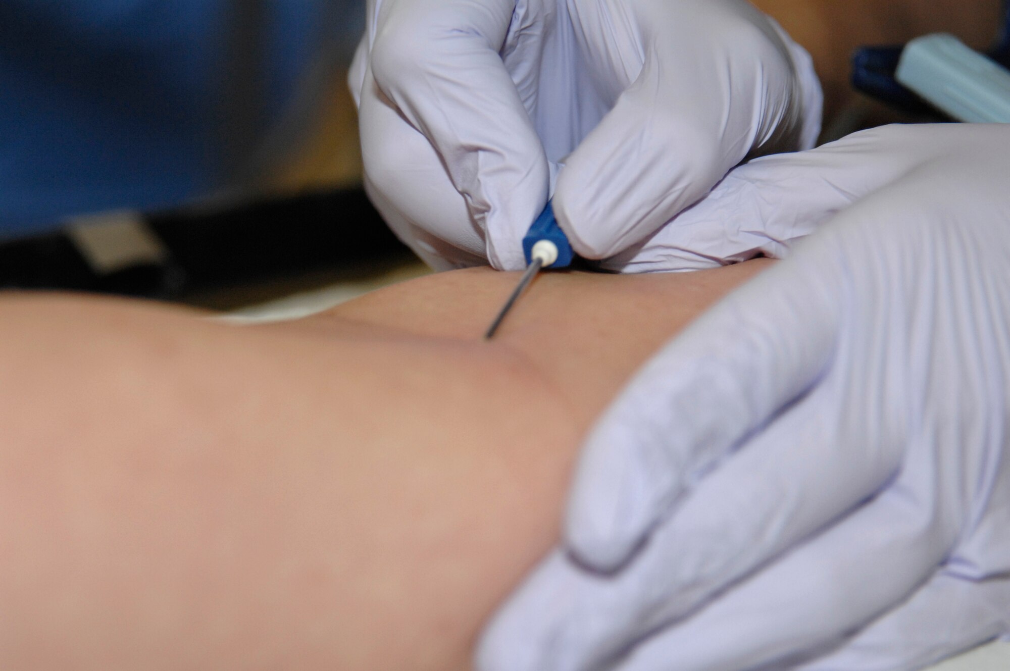 WHITEMAN AIR FORCE BASE, Mo. – A Whiteman Airman gives blood during a Community Blood Center Drive at the Community Activity Center Feb. 26. The Community Blood Center distributes 550 pints of blood a day to more than 70 hospitals in the area. For more information on giving blood visit www.savealifenow.org  . (U.S. Air Force photo/Staff Sgt. Jason Barebo)