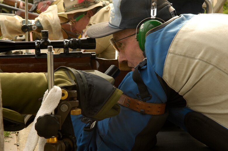 VANDENBERG AIR FORCE BASE, Calif. -- Bob Bliss, competition marksman, stares down the scope of his .22 caliber rifle and takes aim at a target during the Dewars Rifle Match at the Vandenberg Rod and Gun Club here Feb. 28.The competition is held once every month, and serves as a training tool for future national competition matches. (U.S. Air Force photo/Senior Airman Matthew Plew)