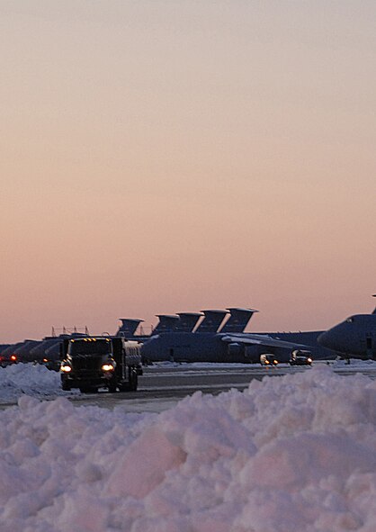 The Dover Air Force Base flight line after snow removal efforts March 3. According to the 436th Operations Support Squadron Weather Flight, from the time the snow started falling at about 4:00 p.m. March 1, until it stopped at about 3:00 p.m. March 2, a total of 10.3 inches of snow fell. (U.S. Air Force Photo/2nd Lt. Brian Maguire)