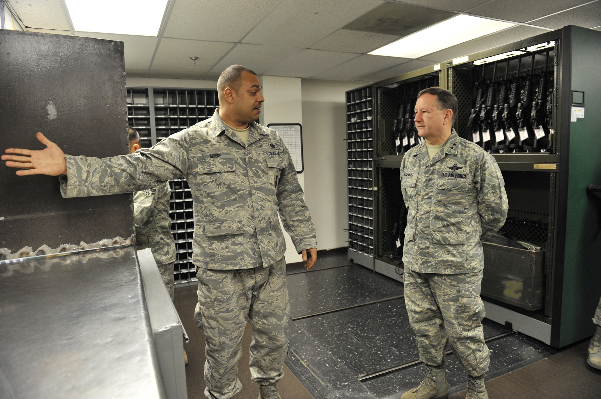 Tech. Sgt. David Moore, NCOIC of the Security Forces armory, briefs visiting Maj. Gen. Frederick Roggero, on day to day operations during his two day visit to Malmstrom Feb. 25-26. General Roggero is the Air Force Chief of Safety. (U.S. Air Force photo/John Turner)