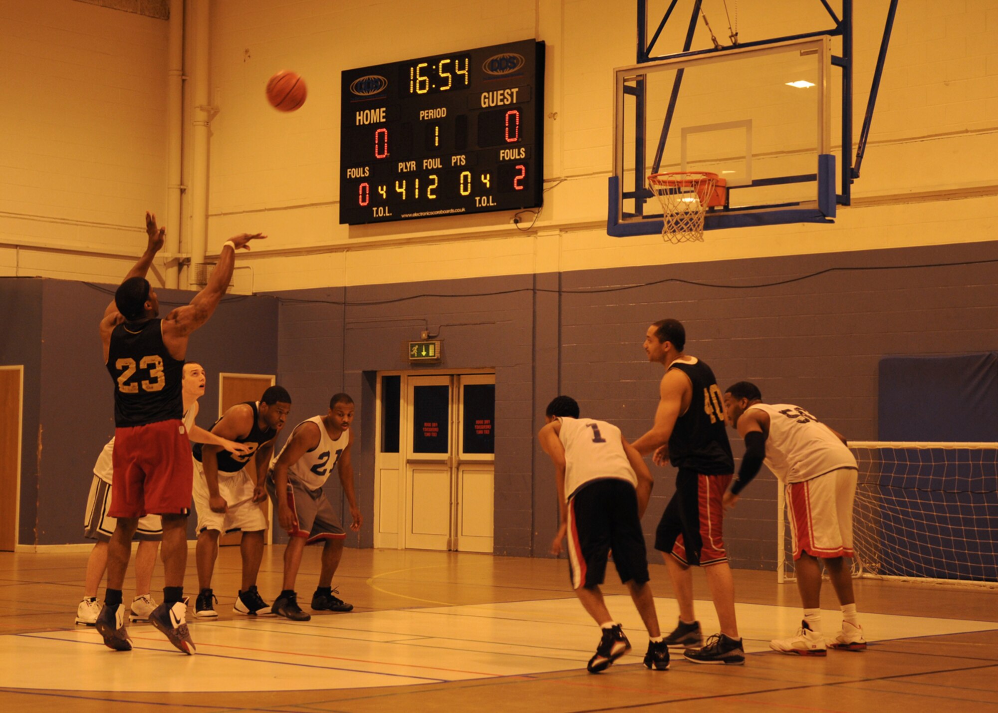 Jonnie Story from the 100th Maintenance Group, attempts a free throw during the Intramural Basketball Championship game at the Northside Fitness Center Feb. 25, 2009, at RAF Mildenhall, England. Both teams battled for two 20-minute periods with the score of 49-49 at the end of regulation play. A five-minute overtime period took place where MXG edged out LRS in a 55-51 point victory to become RAF Mildenhall’s 2009’s Intramural Basketball Champions. (U.S. Air Force photo by Staff Sgt. Jerry Fleshman)
