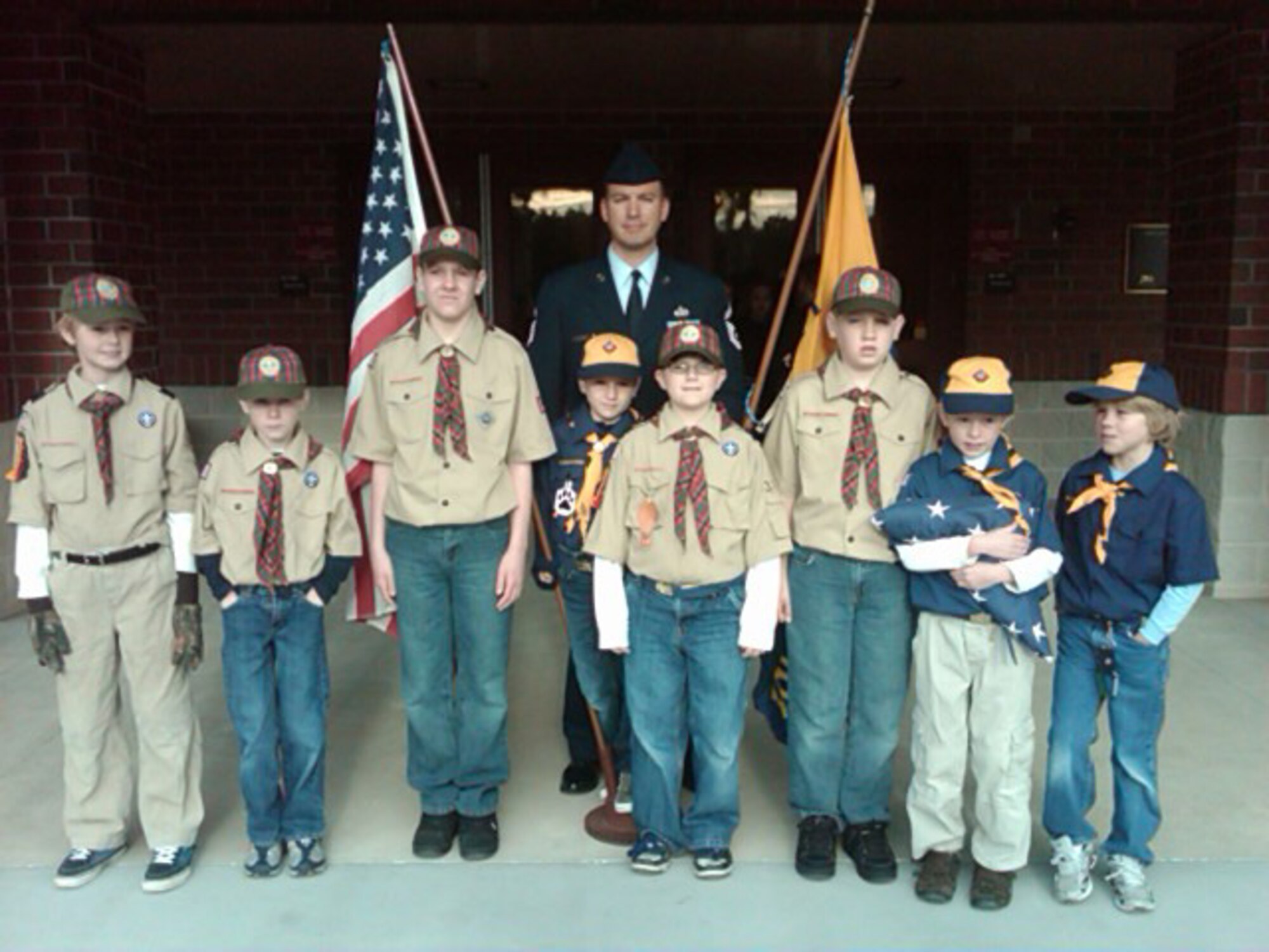 SEYMOUR JOHNSON AIR FORCE BASE, N.C. -- Senior Master Sgt. Brian Bischoff, superintendent with the 916th Communication Squadron, participated in a flag ceremonywith the Boy Scouts at his son's school. Sgt. Bischoff ended his time with 916th during the February unit training assembly, transferring to a wing in Florida.