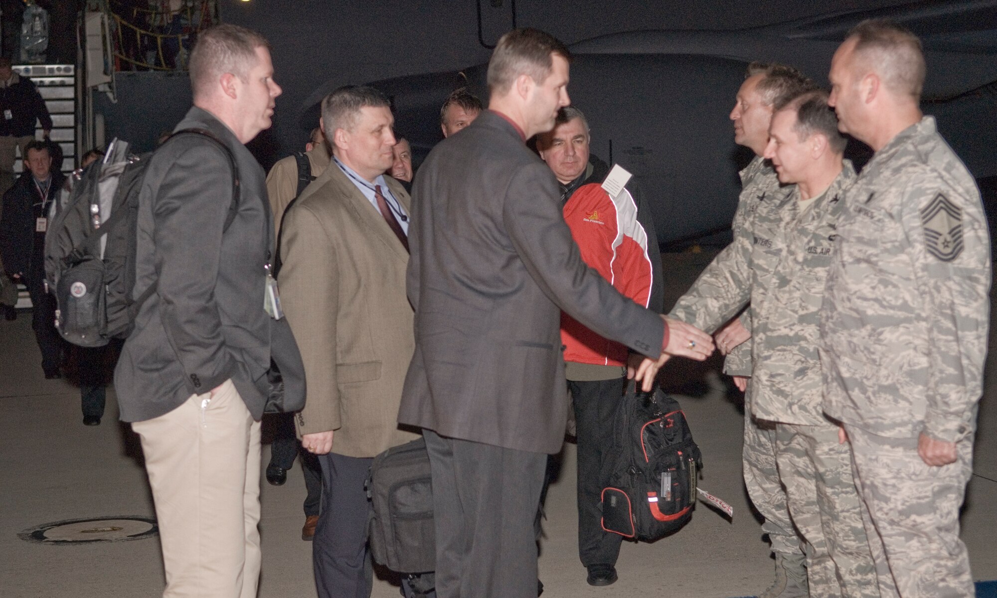 VANDENBERG AIR FORCE BASE, Calif. -- Col. David Buck, 30th Space Wing commander, and Col. Steven Winters, 30th SW vice commander, welcome members from the Strategic Arms Reduction Treaty team as they arrive at Vandenberg March 3. (U.S. Air Force photo/Christopher Hubenthal)