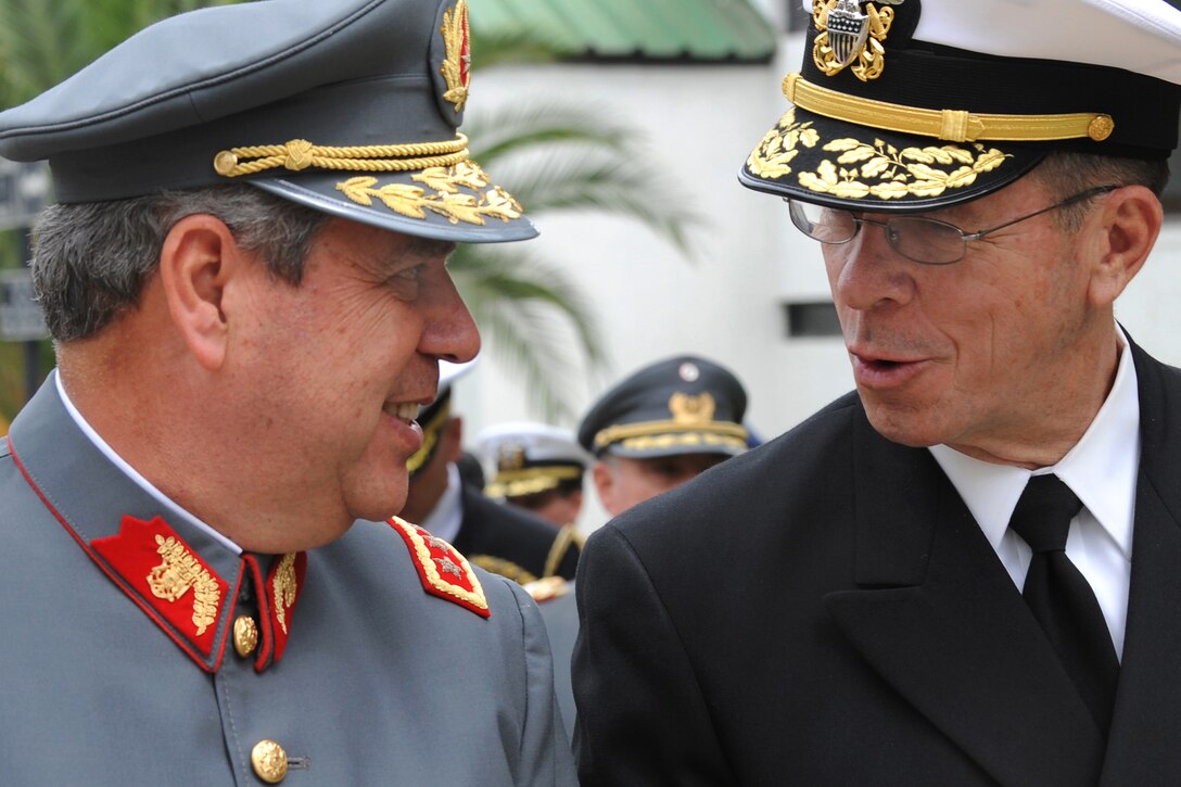 U.S. Navy Adm. Mike Mullen, chairman of the Joint Chiefs of Staff, talks to Chilean Army Lt. Gen. Alfredo Ewing, director of the National Defense Staff, in Santiago, Chile, March 3, 2009.